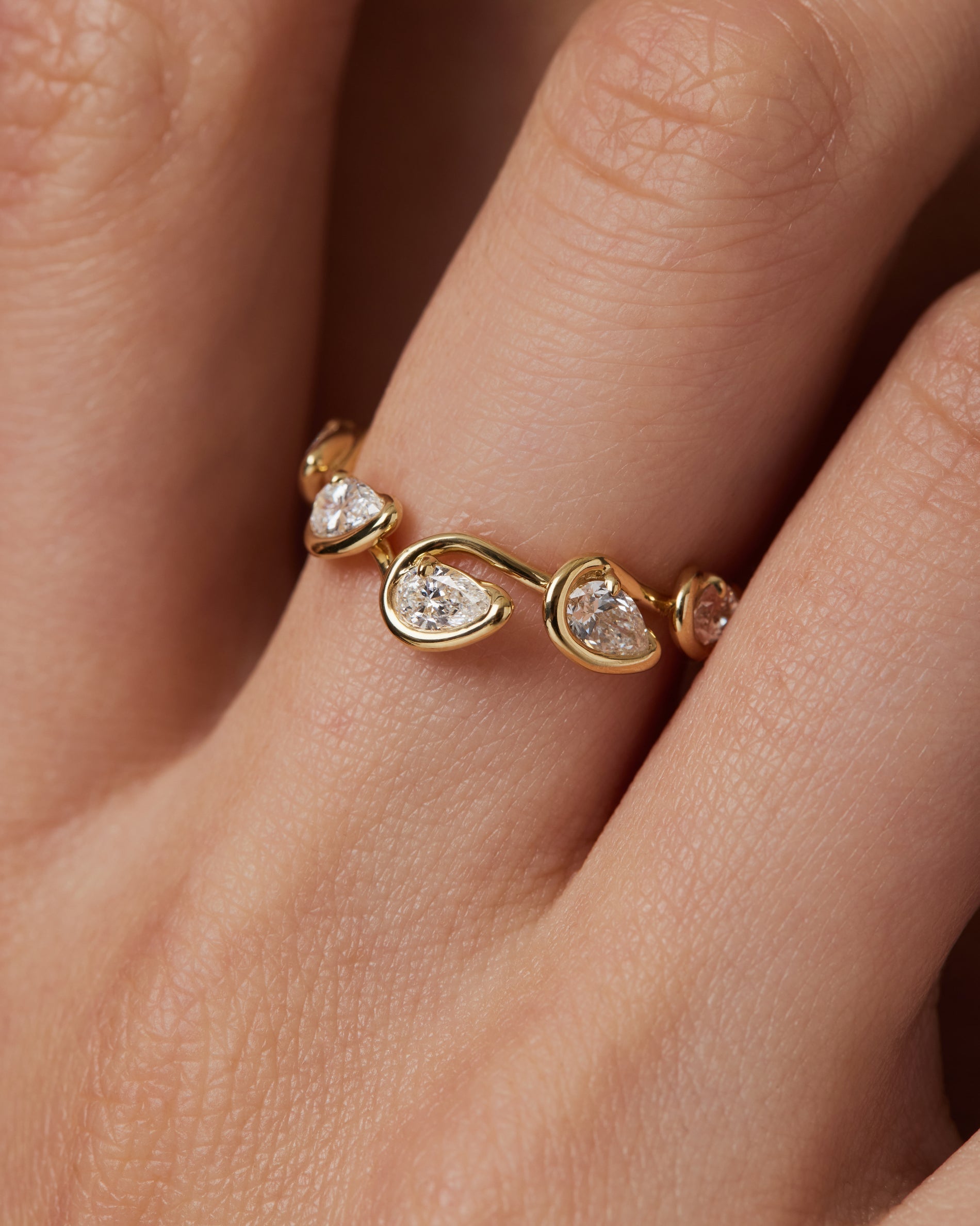 0.10 TCW Pear EF-VVS Diamond bezel Wedding Band