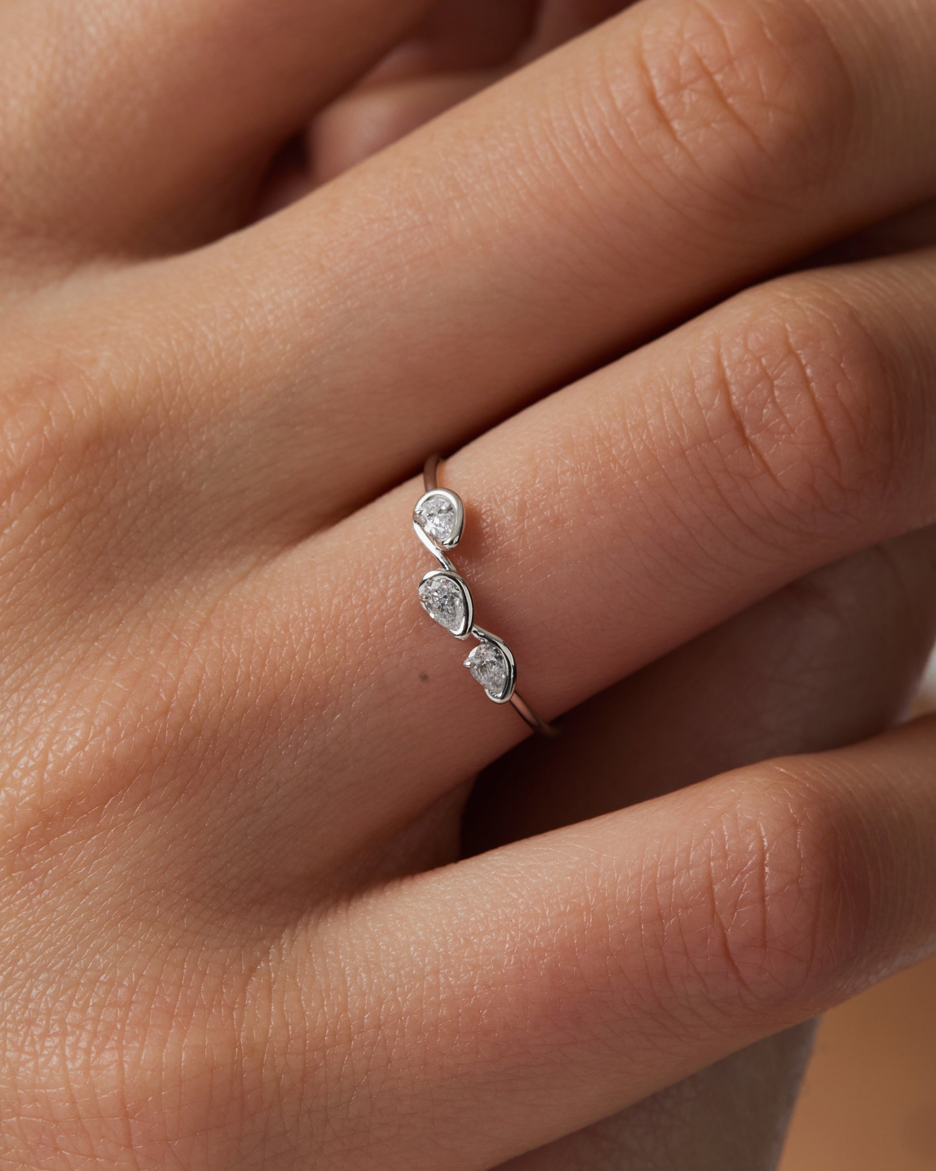 0.18 TCW Pear EF-VVS Diamond bezel Wedding Band