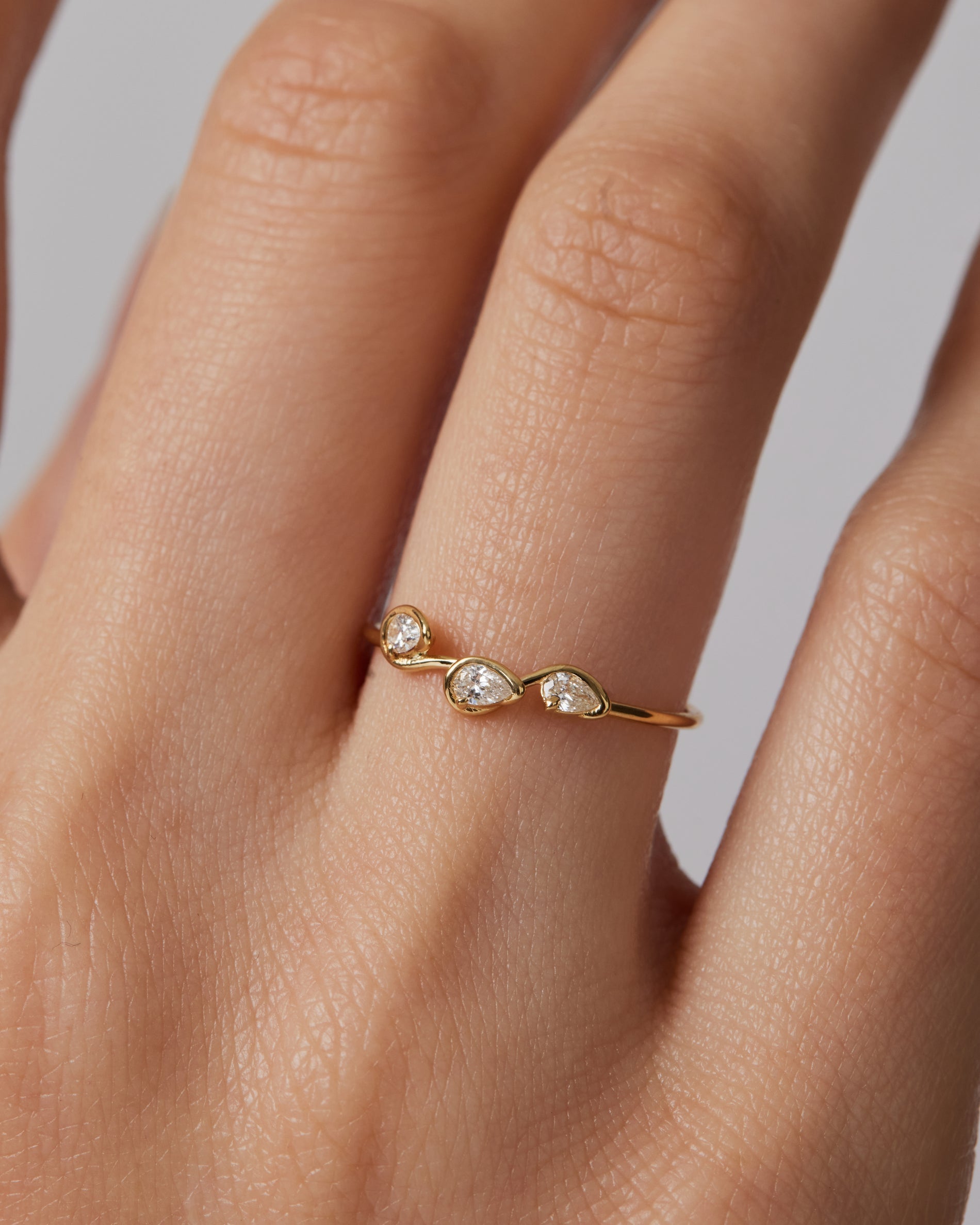 0.18 TCW Pear EF-VVS Diamond bezel Wedding Band