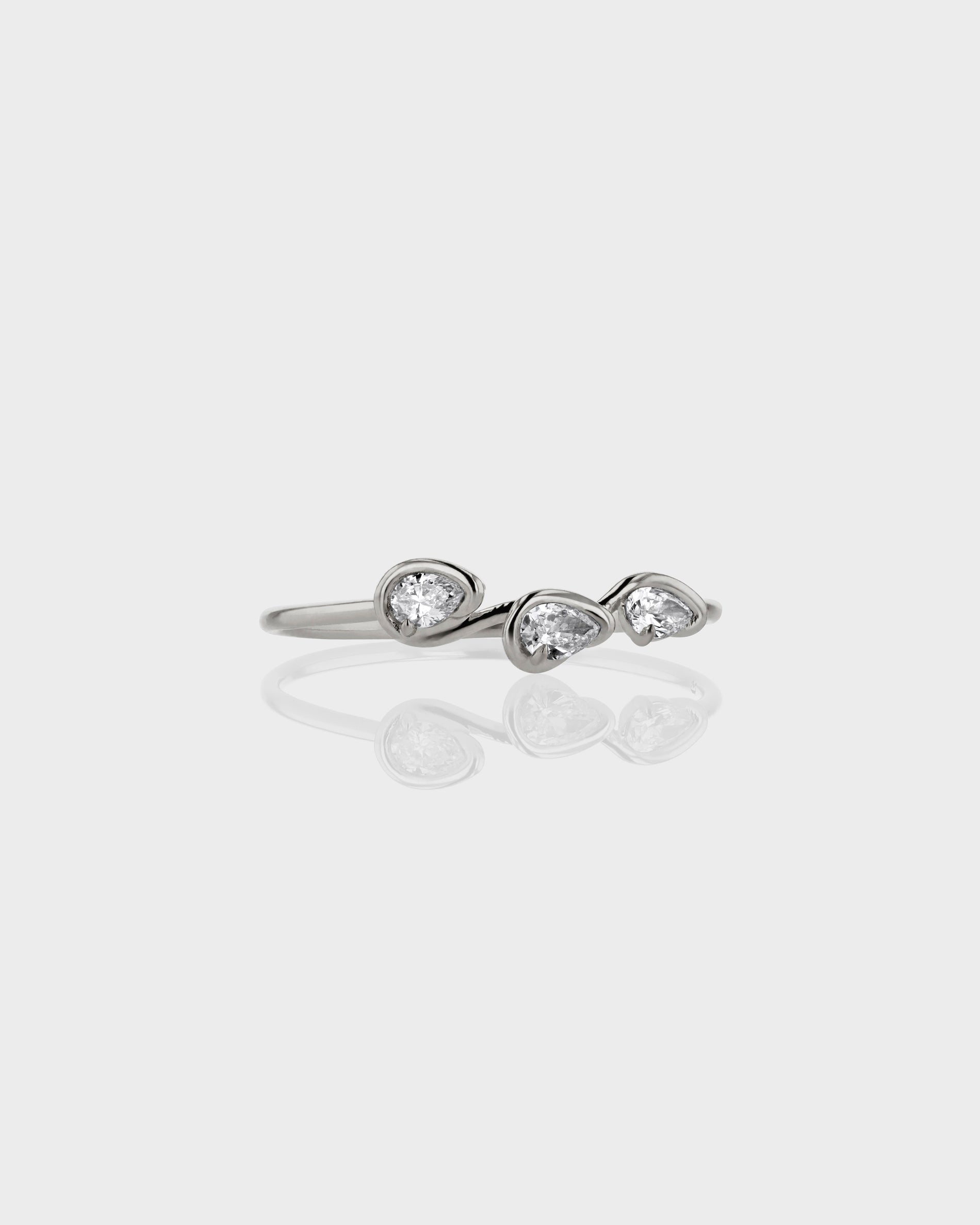 0.18 TCW Pear EF-VVS Diamond bezel Wedding Band