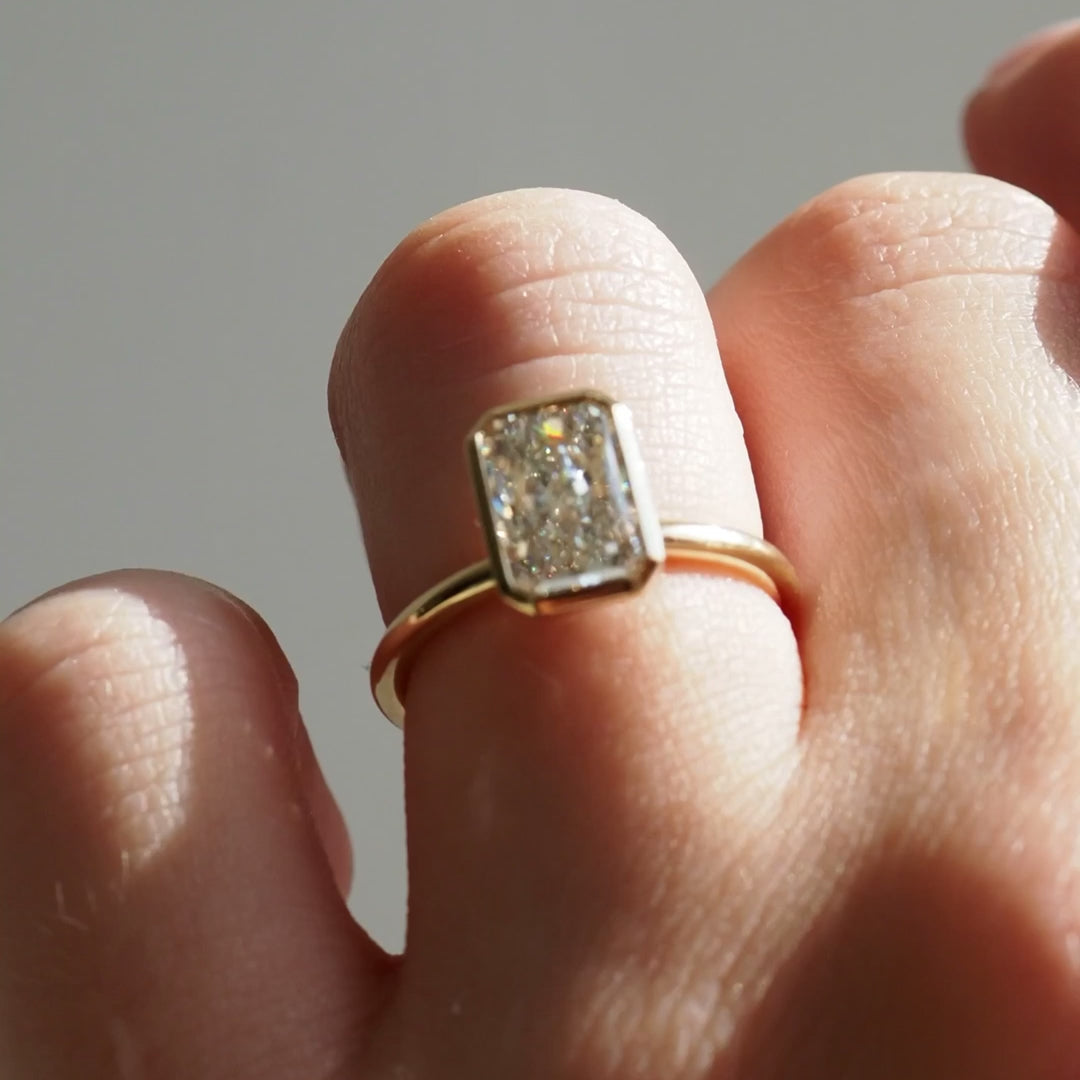 1.50 to 3.50 CT radiant cut lab grown CVD diamond engagement ring with bezel setting in modern elegant style