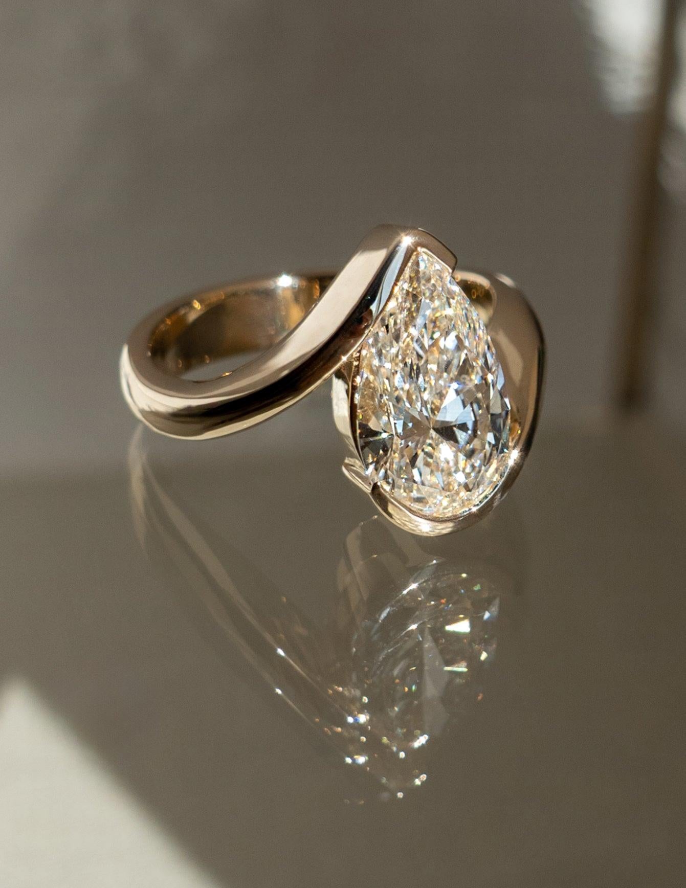1.0 - 2.5 CT Pear Shaped Lab Grown Diamond Bypass Style Engagement Ring