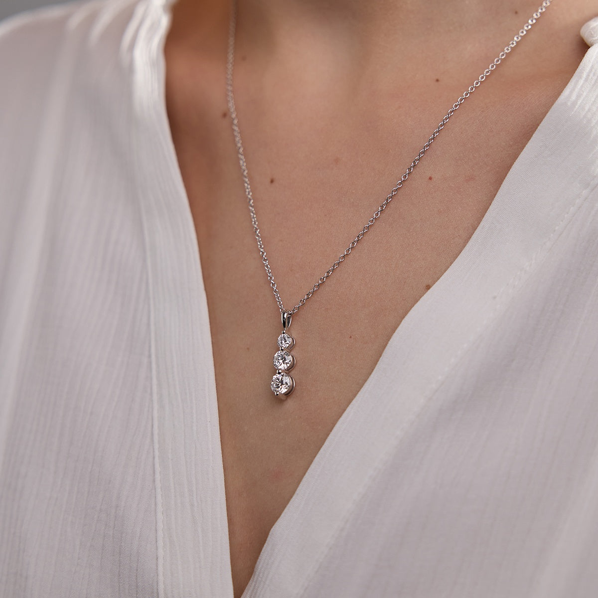 1.50 TCW Round Moissanite Diamond Three-Stone Drop Pendant Necklace - Camila Brown