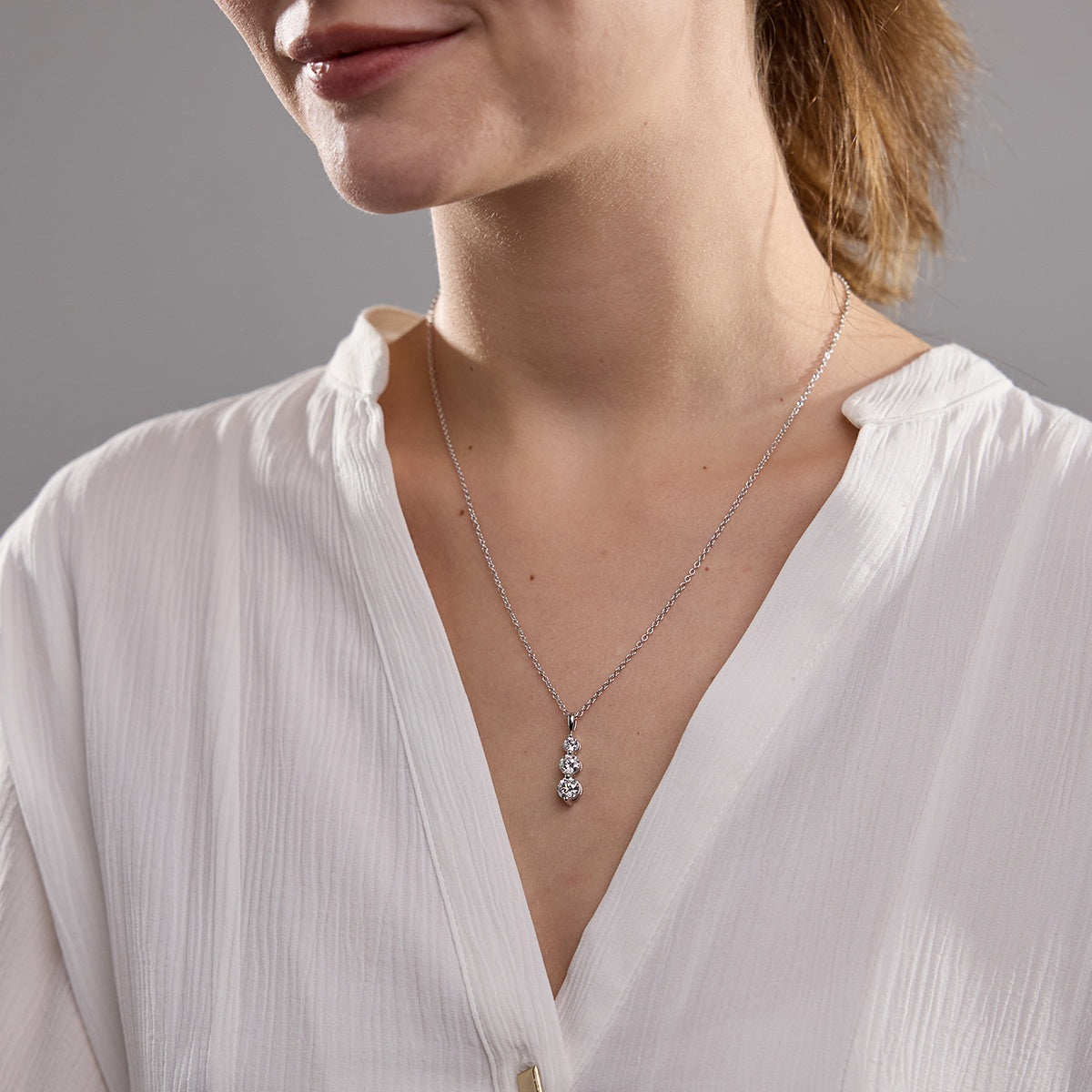 1.50 TCW Round Moissanite Diamond Three-Stone Drop Pendant Necklace - Camila Brown