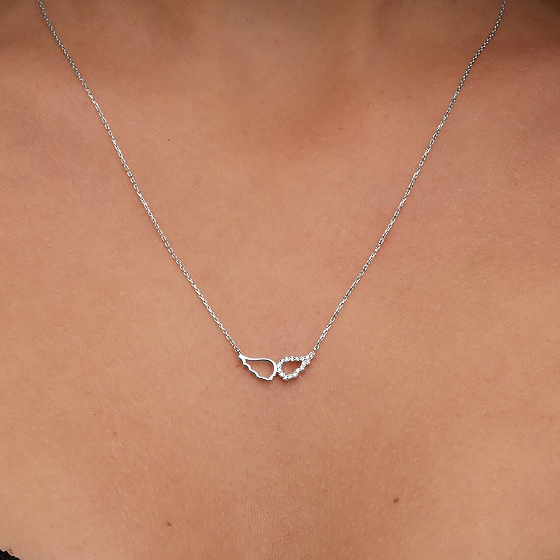 0.10 TCW Round Moissanite Diamond Wing Pendent Necklace - Camila Brown