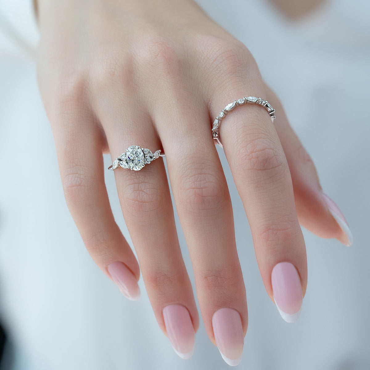 Oval cut CVD diamond cluster engagement ring in white gold setting