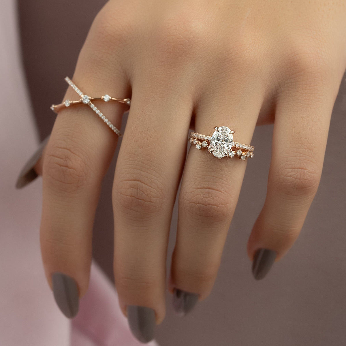Oval cut CVD diamond engagement ring featuring hidden halo and pave band in platinum