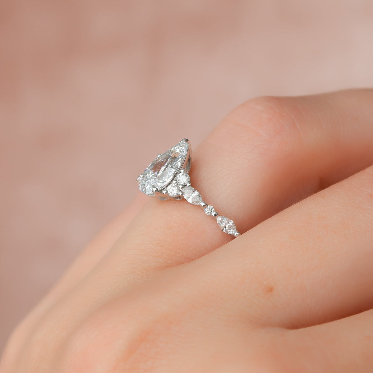 Pear cut CVD diamond cluster engagement ring in white gold setting