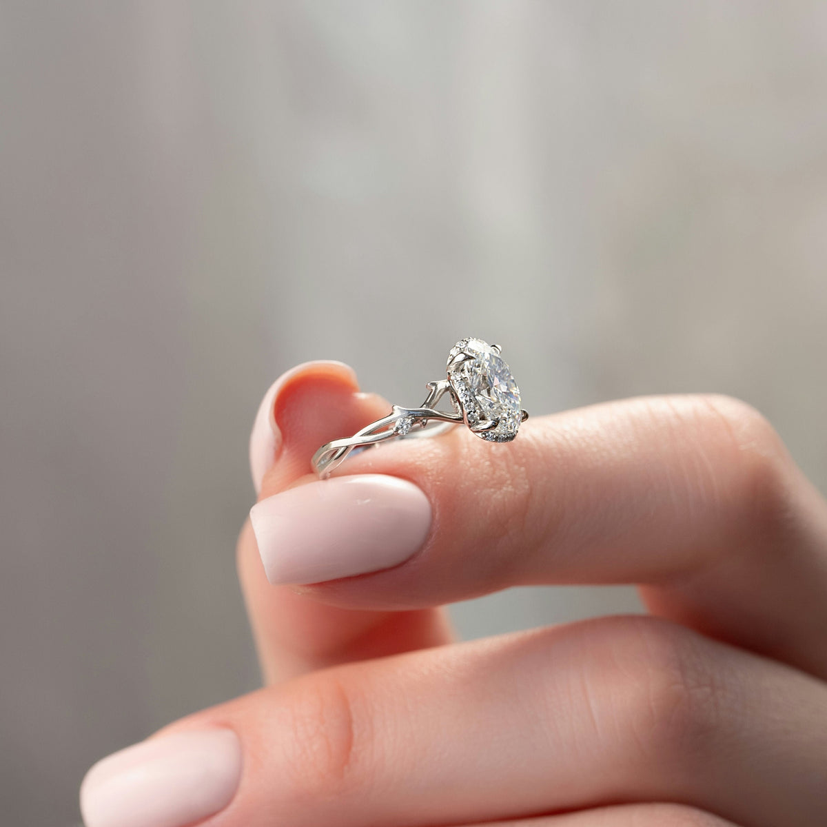 Oval cut moissanite twig engagement ring with nature-inspired band in white gold, 1.50-3.50 CT

