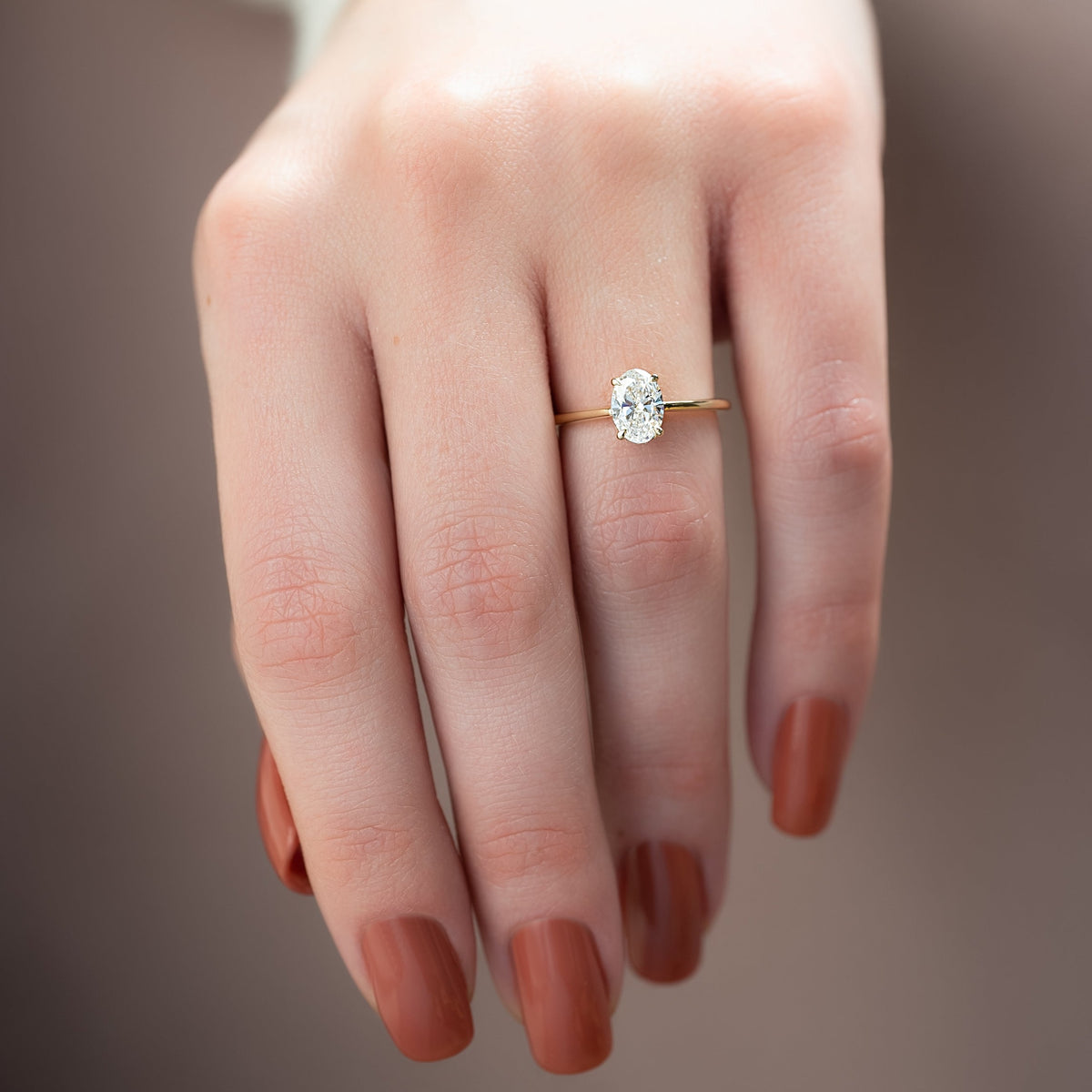Oval cut CVD diamond engagement ring with hidden halo in white gold setting