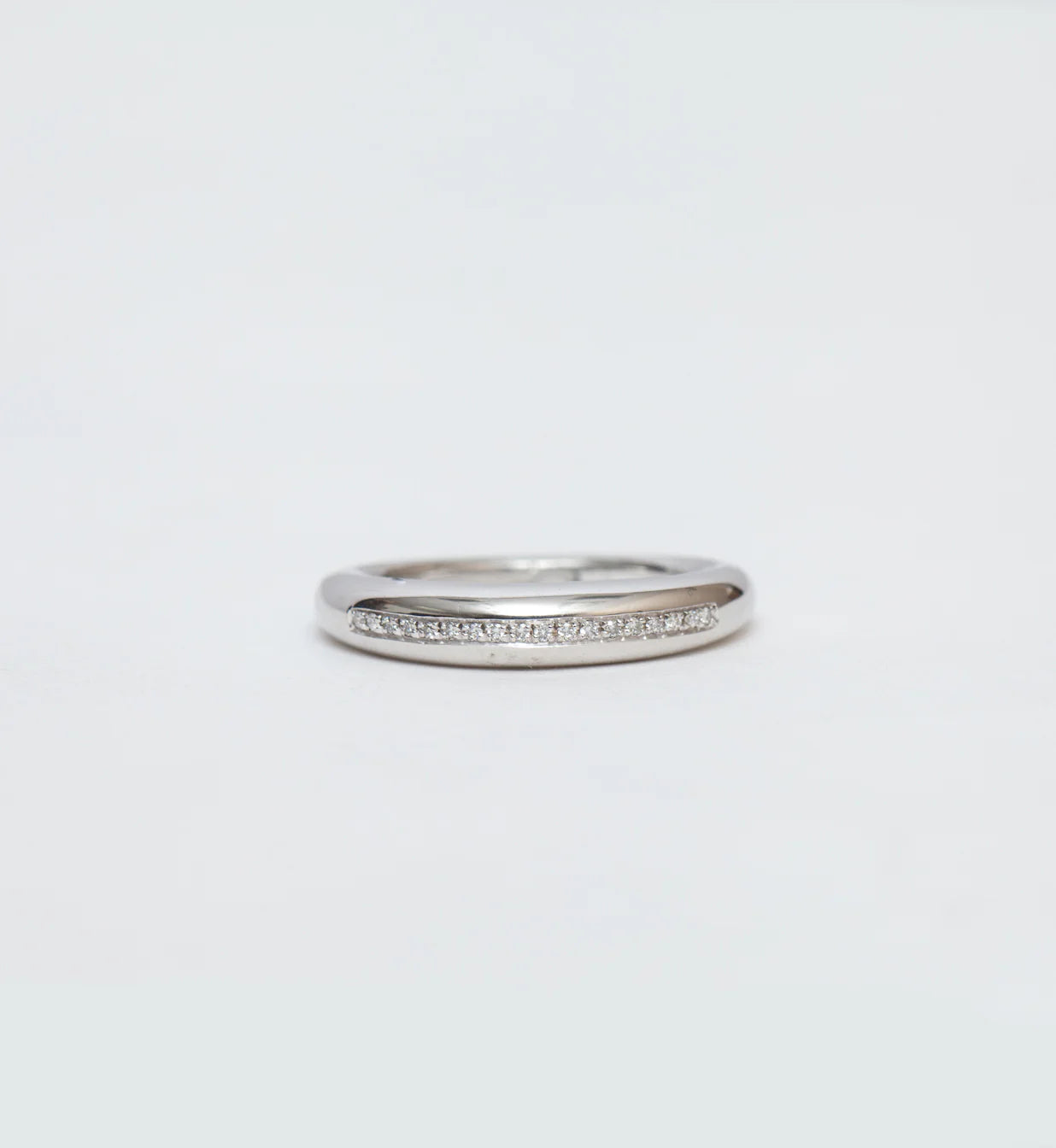 0.11 TCW Round CVD Diamond Channel Setting Wedding Band