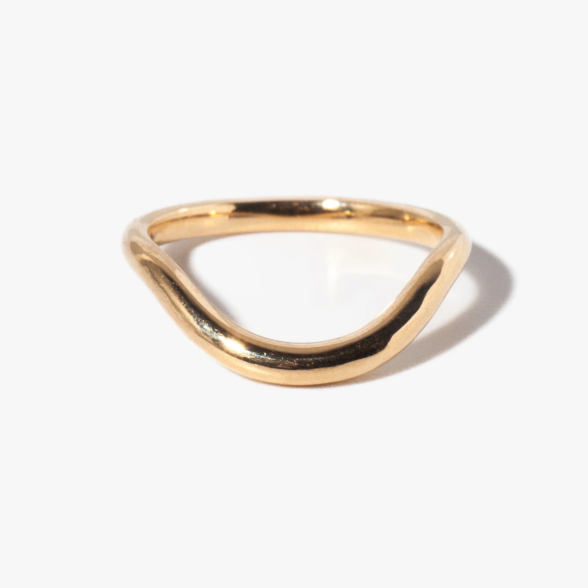 Plain curved wedding band