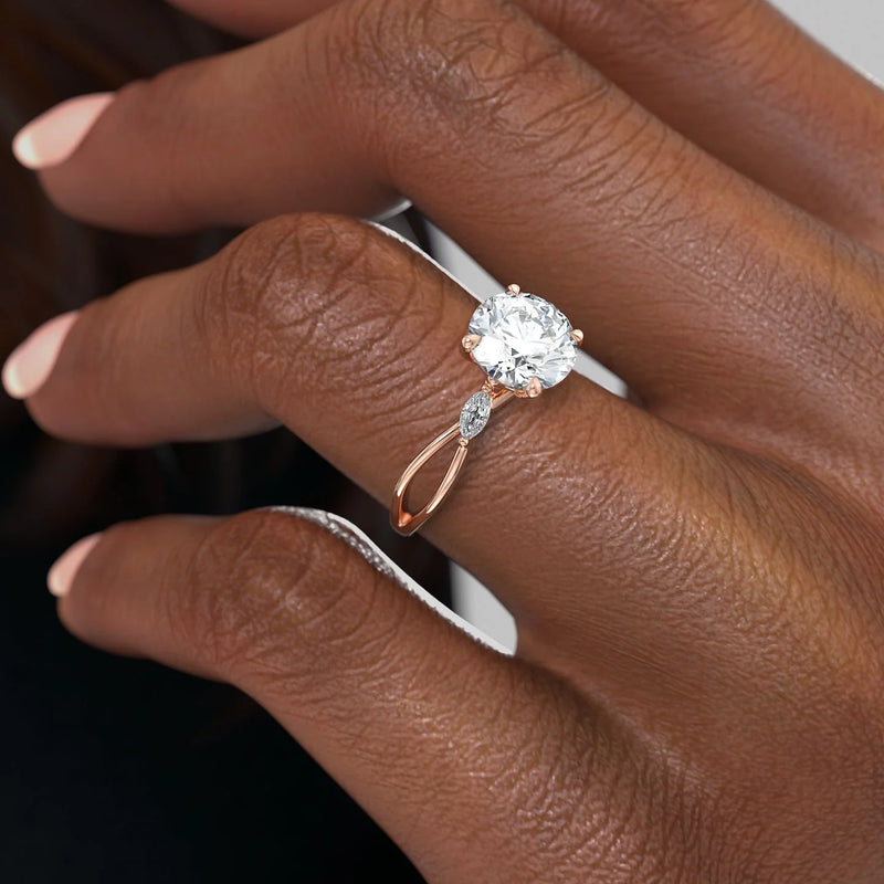 Round cut CVD diamond three stone engagement ring in white gold setting