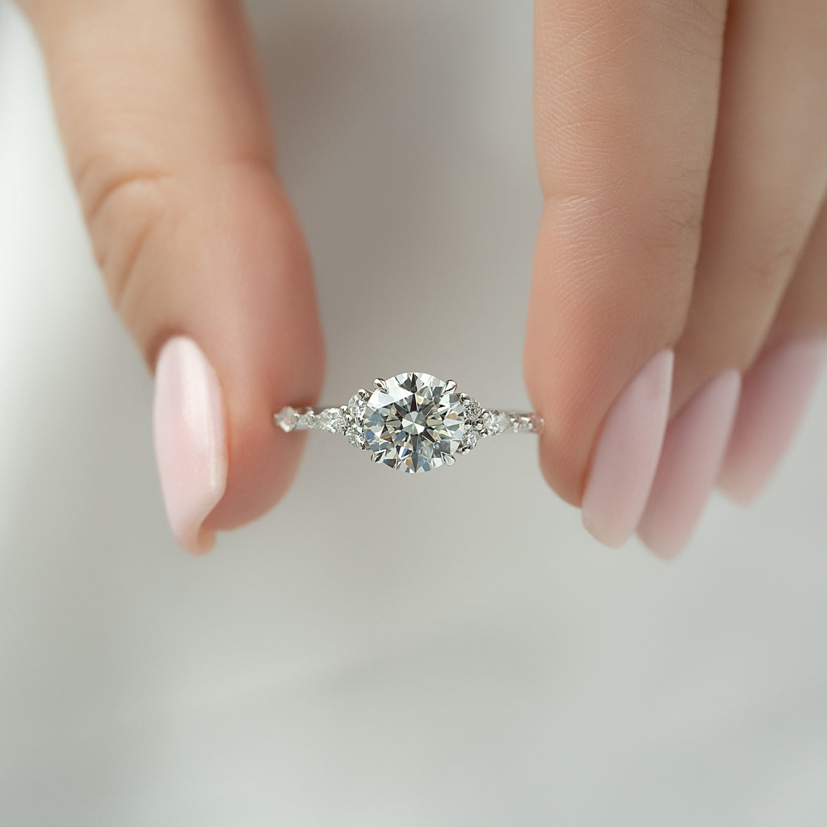 Round cut CVD diamond cluster engagement ring in white gold setting