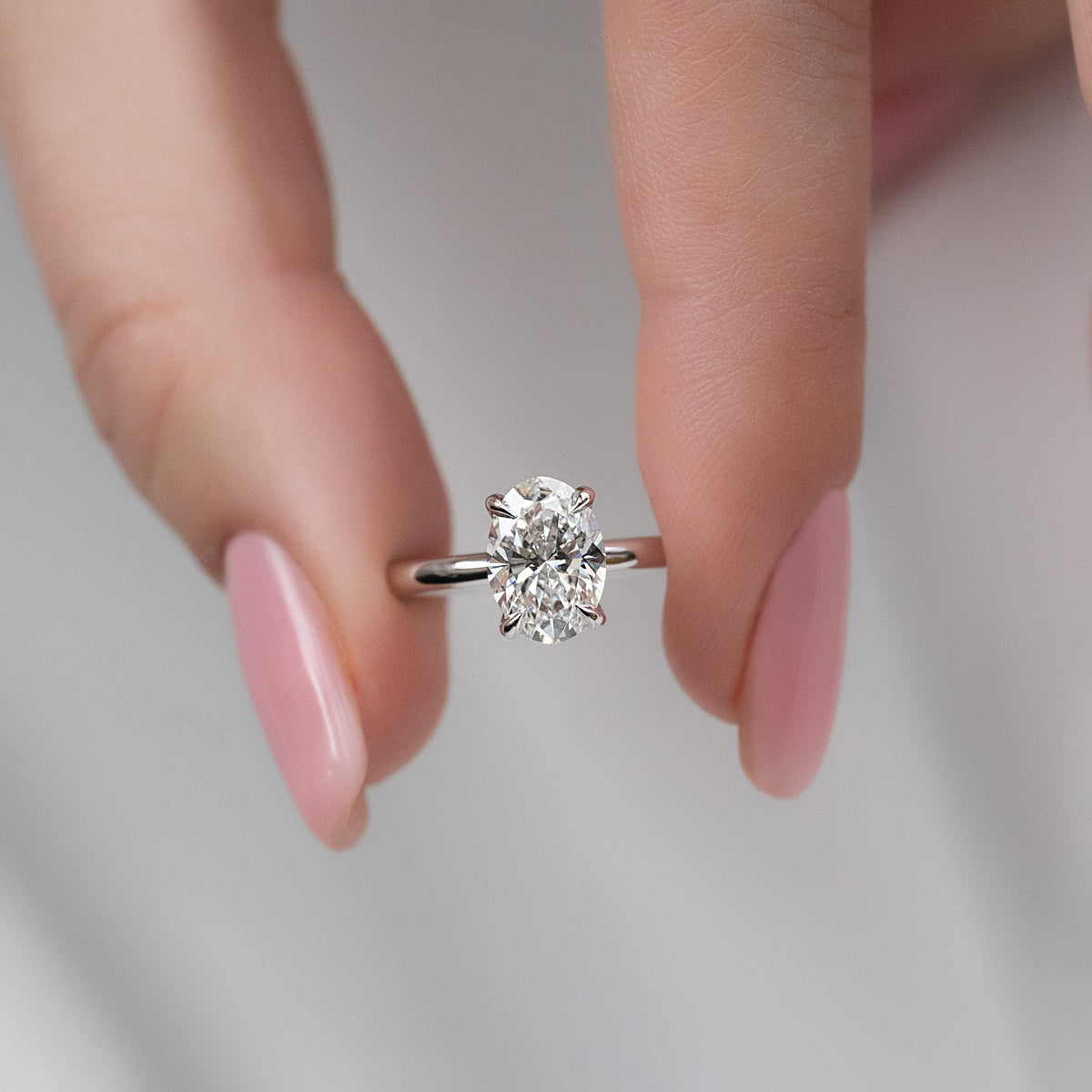 Oval cut CVD diamond solitaire engagement ring in platinum setting