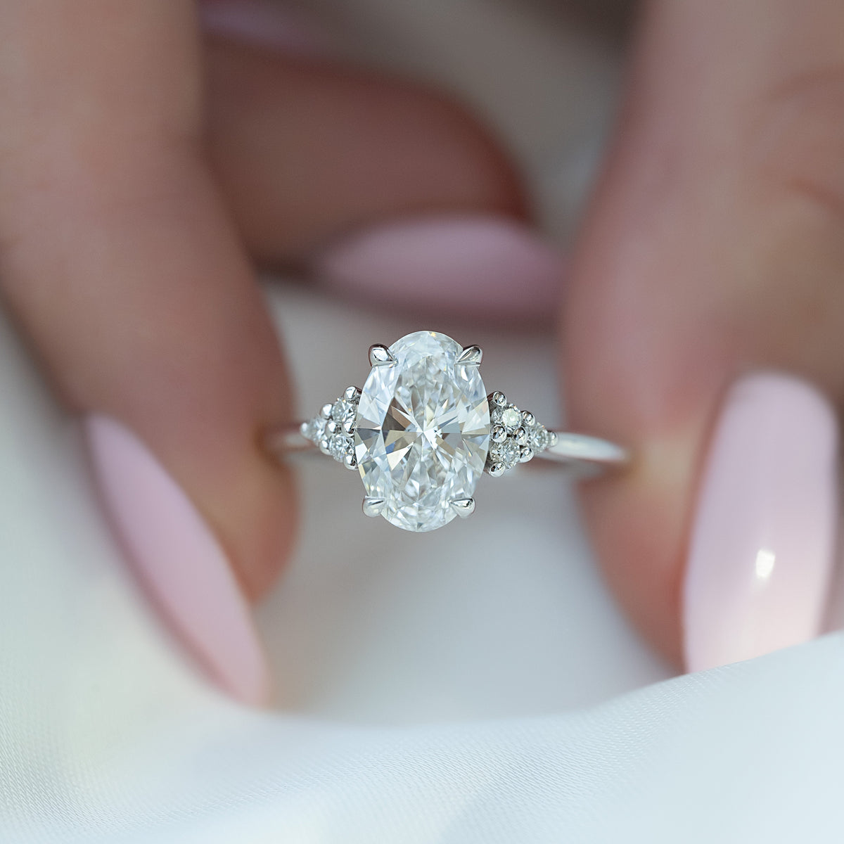 Oval cut moissanite cluster engagement ring in white gold setting, 2.0-4.0 CT