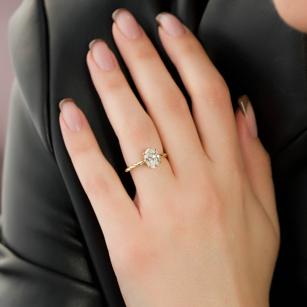 Oval cut CVD diamond engagement ring with hidden halo in platinum setting