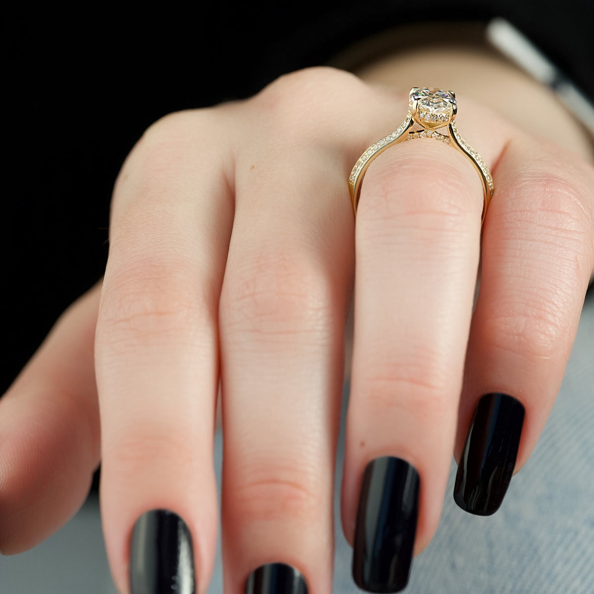 Oval cut CVD diamond hidden halo engagement ring with pave band in white gold setting