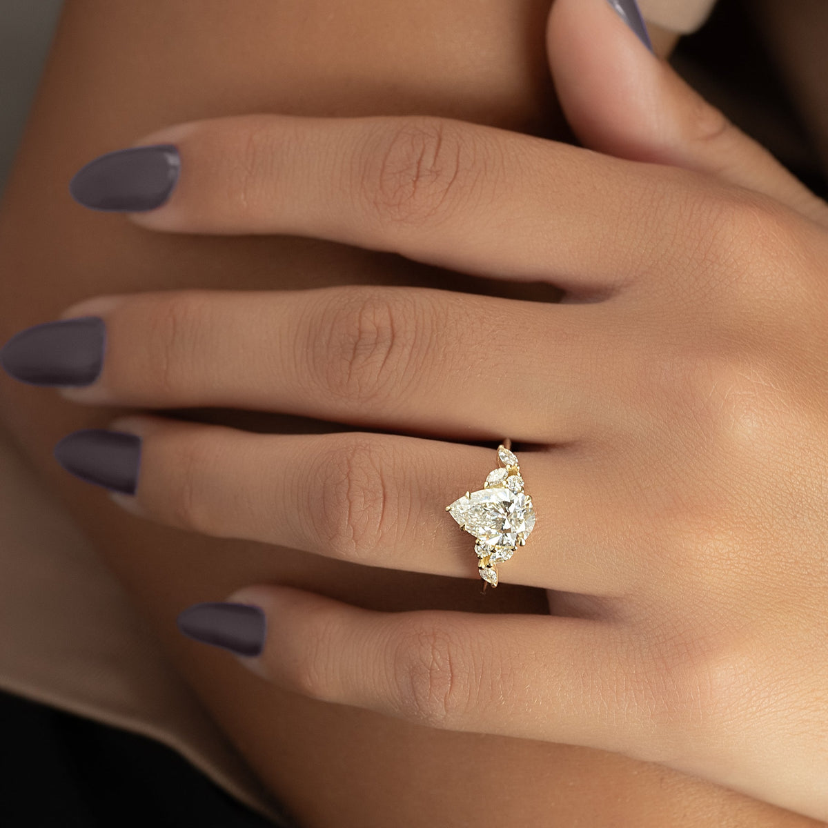Pear cut CVD diamond cluster engagement ring in platinum setting