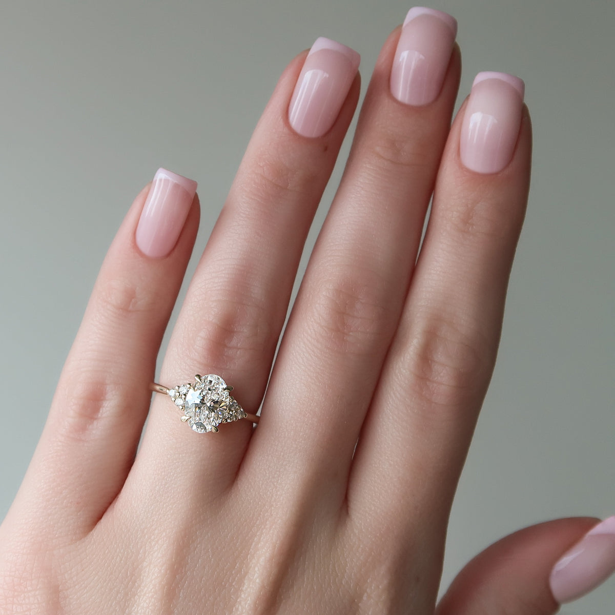 Oval cut moissanite cluster engagement ring in white gold setting, 2.0-4.0 CT