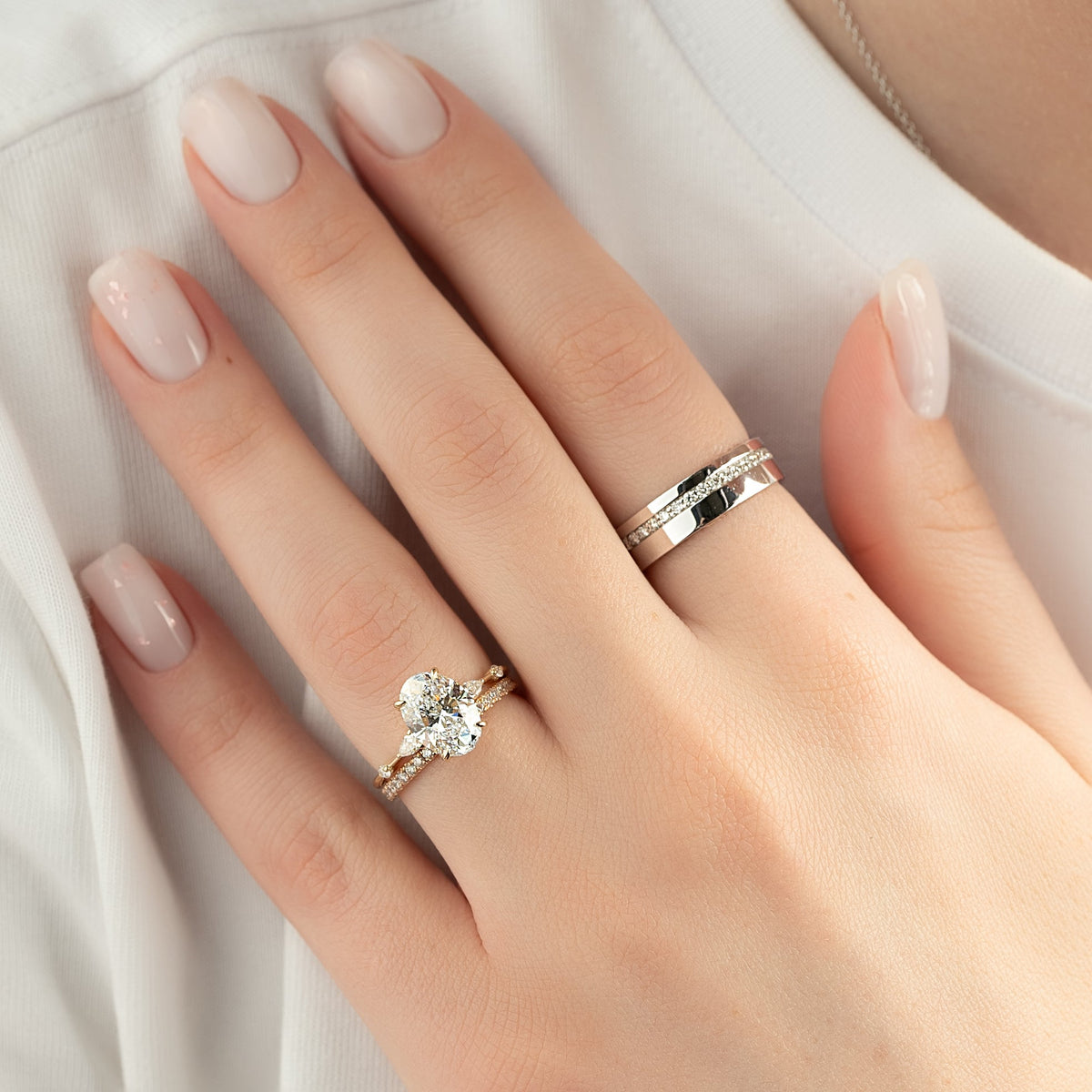 Oval cut CVD diamond hidden halo engagement ring in white gold setting