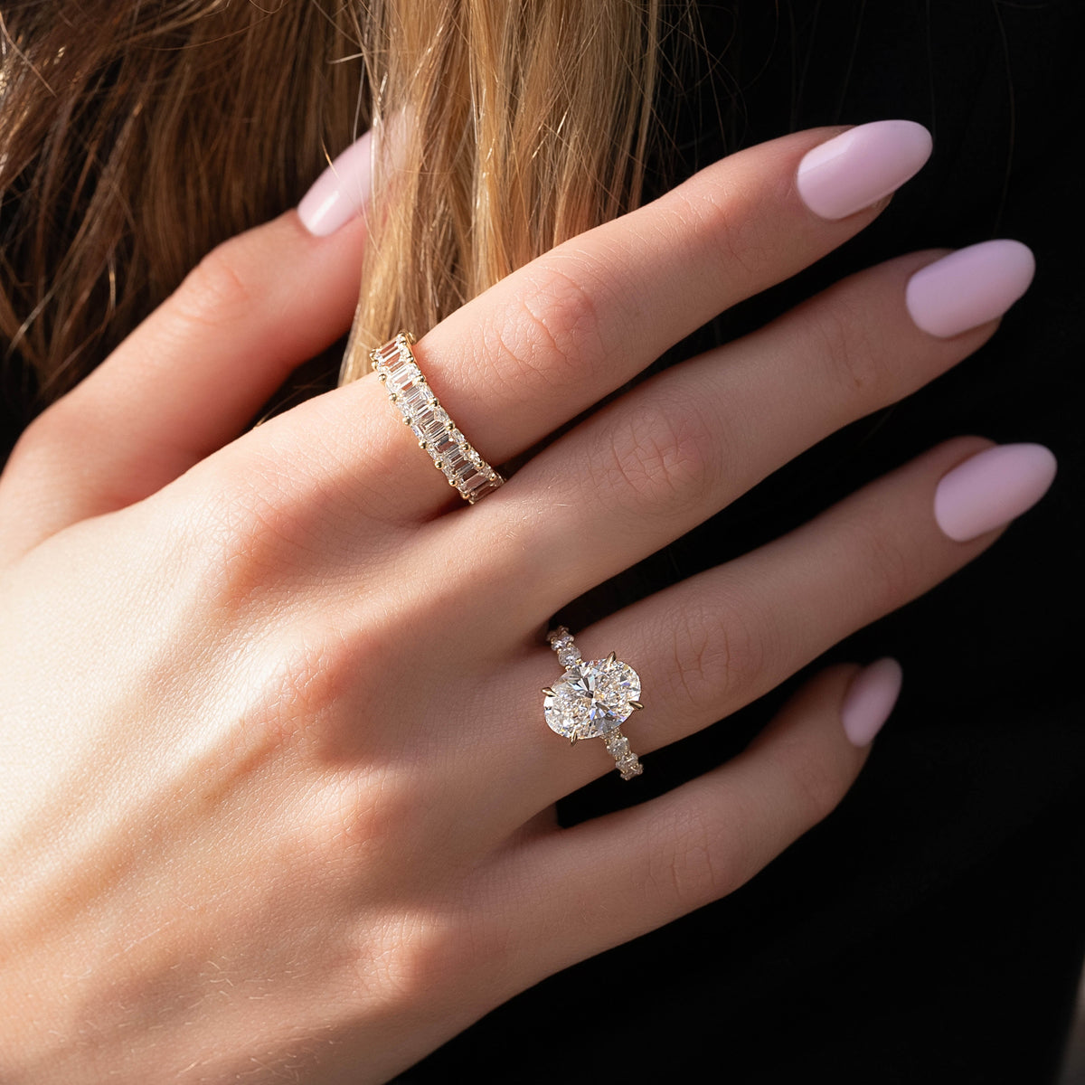 Oval cut CVD diamond hidden halo engagement ring with pave band in white gold