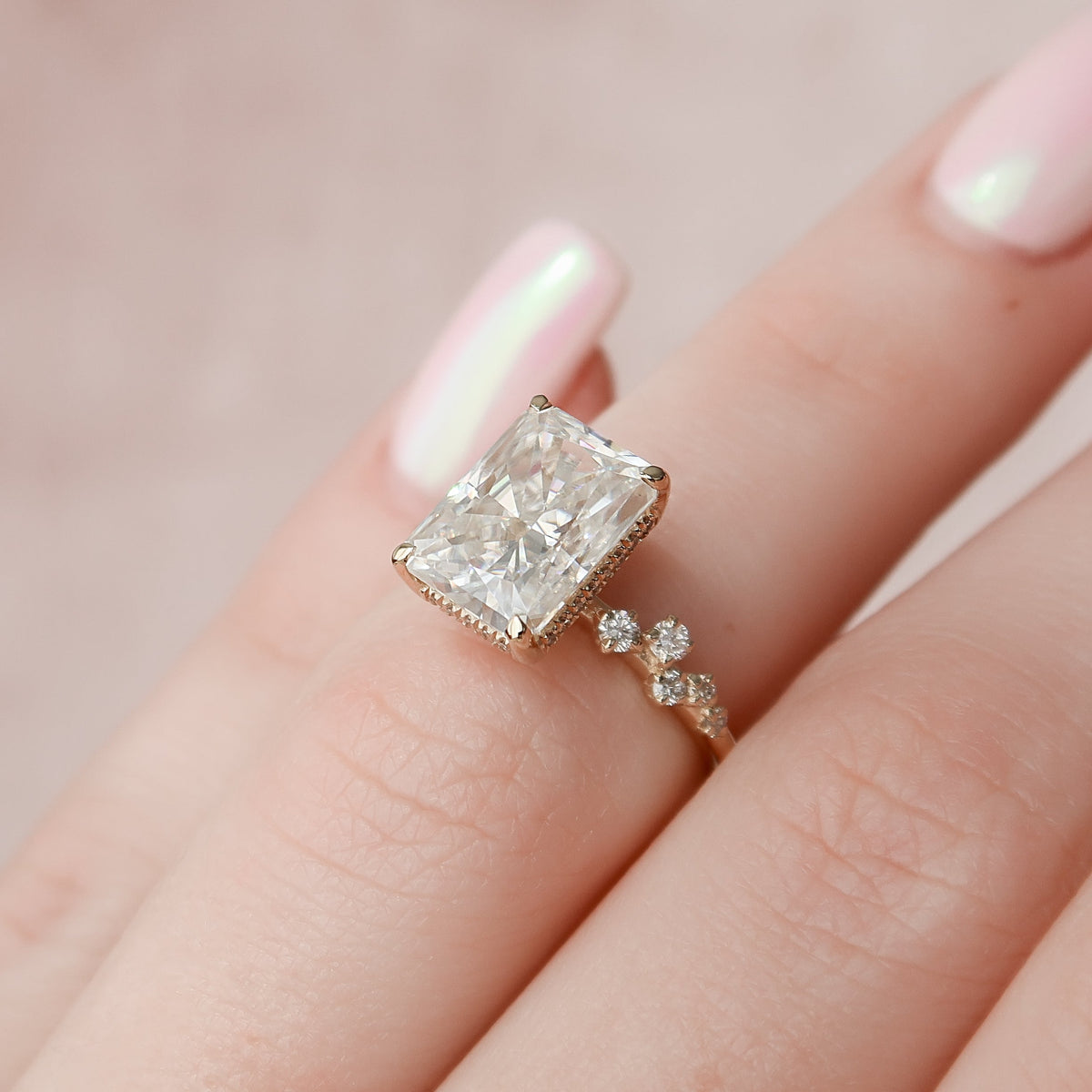 Radiant cut CVD diamond engagement ring with hidden halo and clustered diamond detailing in white gold