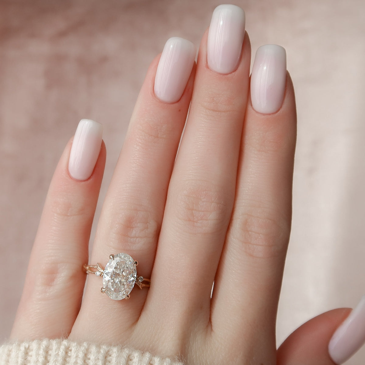 Oval cut CVD diamond engagement ring with twig-style band in white gold