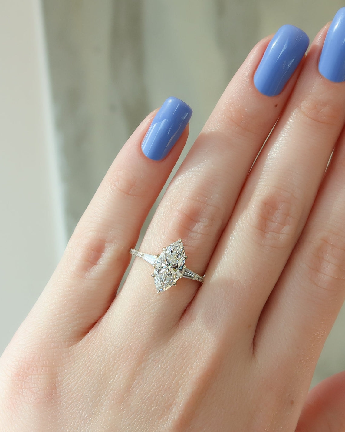 Marquise cut CVD diamond three stone engagement ring with pave band in white gold