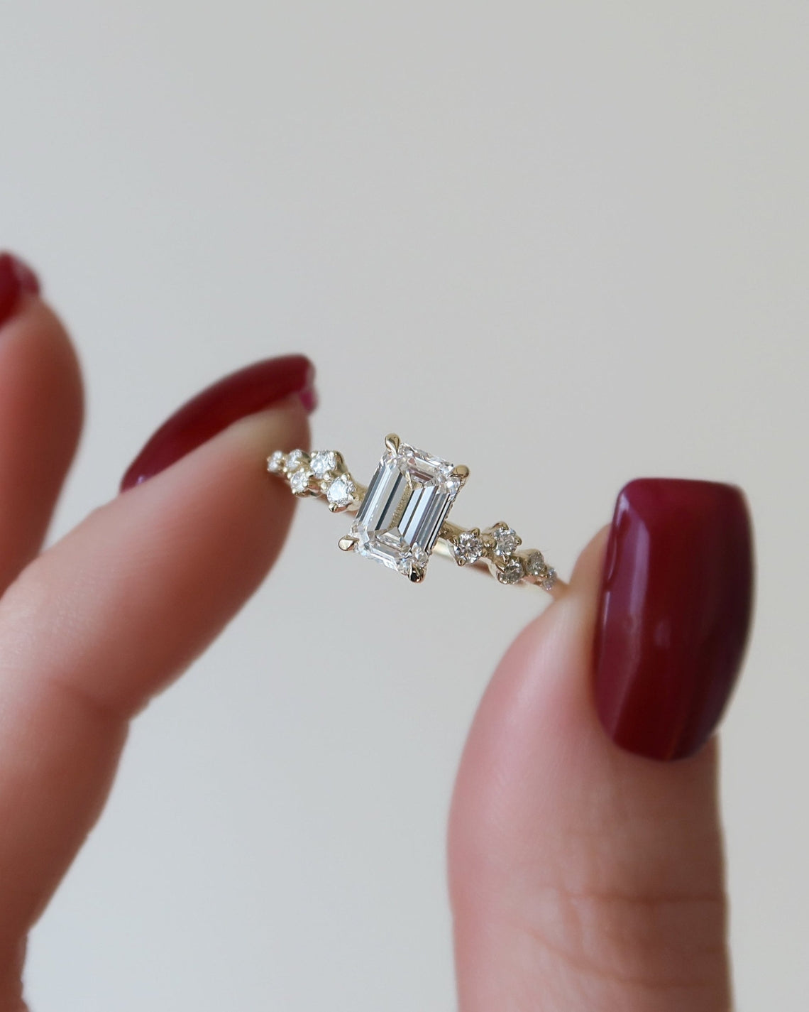 Emerald cut moissanite cluster engagement ring with hidden halo in white gold setting, 1.50-3.50 CT