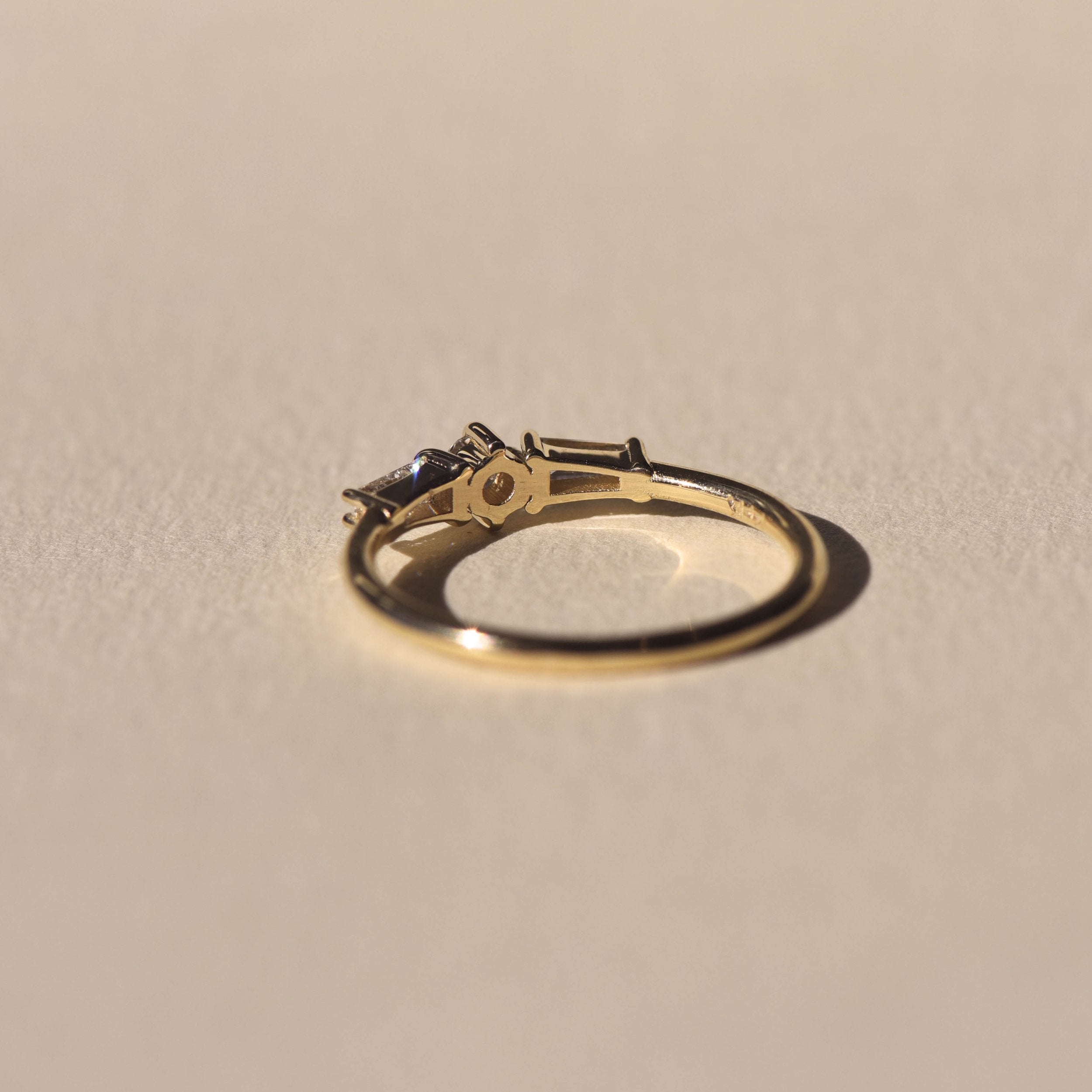 0.4 TCW Round&Tappered Baguette Cut Three Stone Engagement Ring