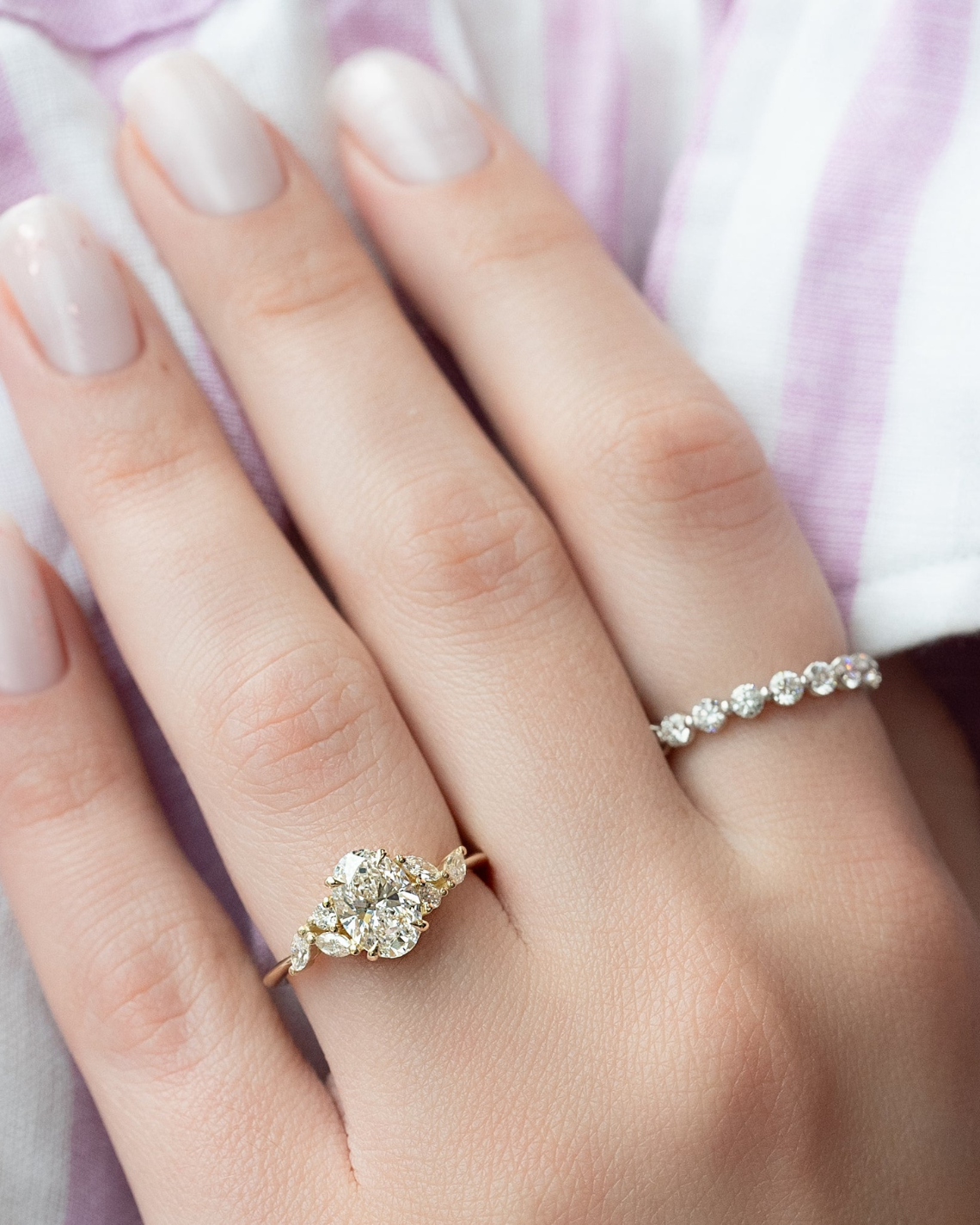 Oval cut CVD diamond cluster engagement ring in white gold setting