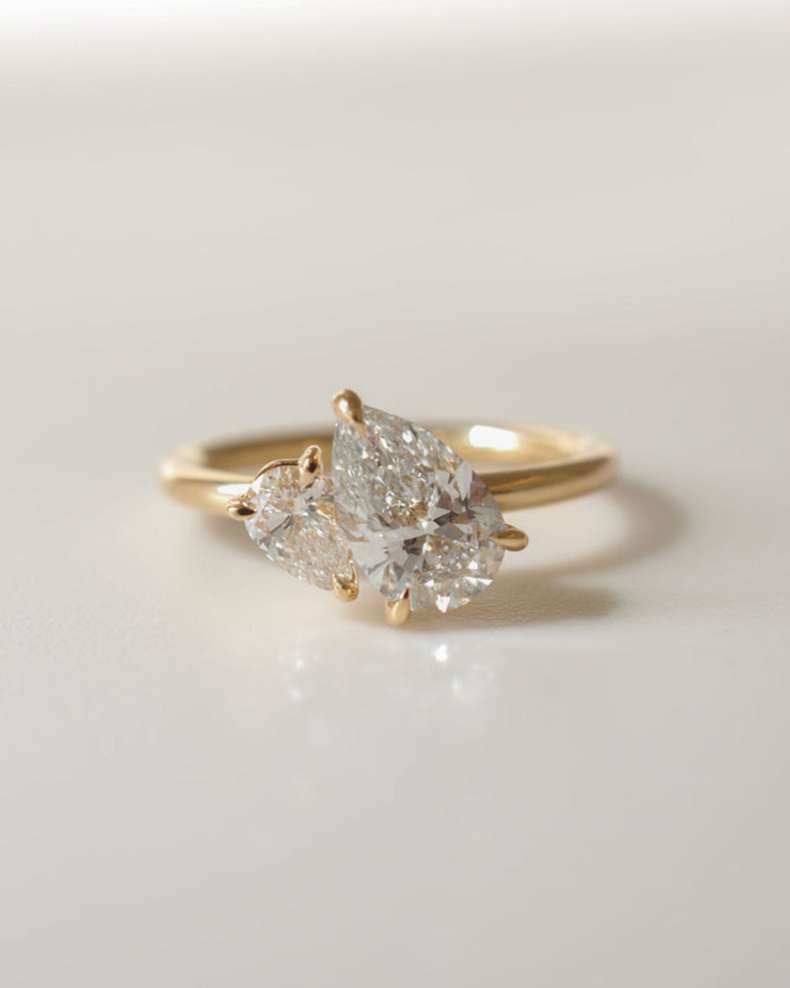 Pear cut moissanite two-stone engagement ring in white gold setting, 1.0-3.0 carats