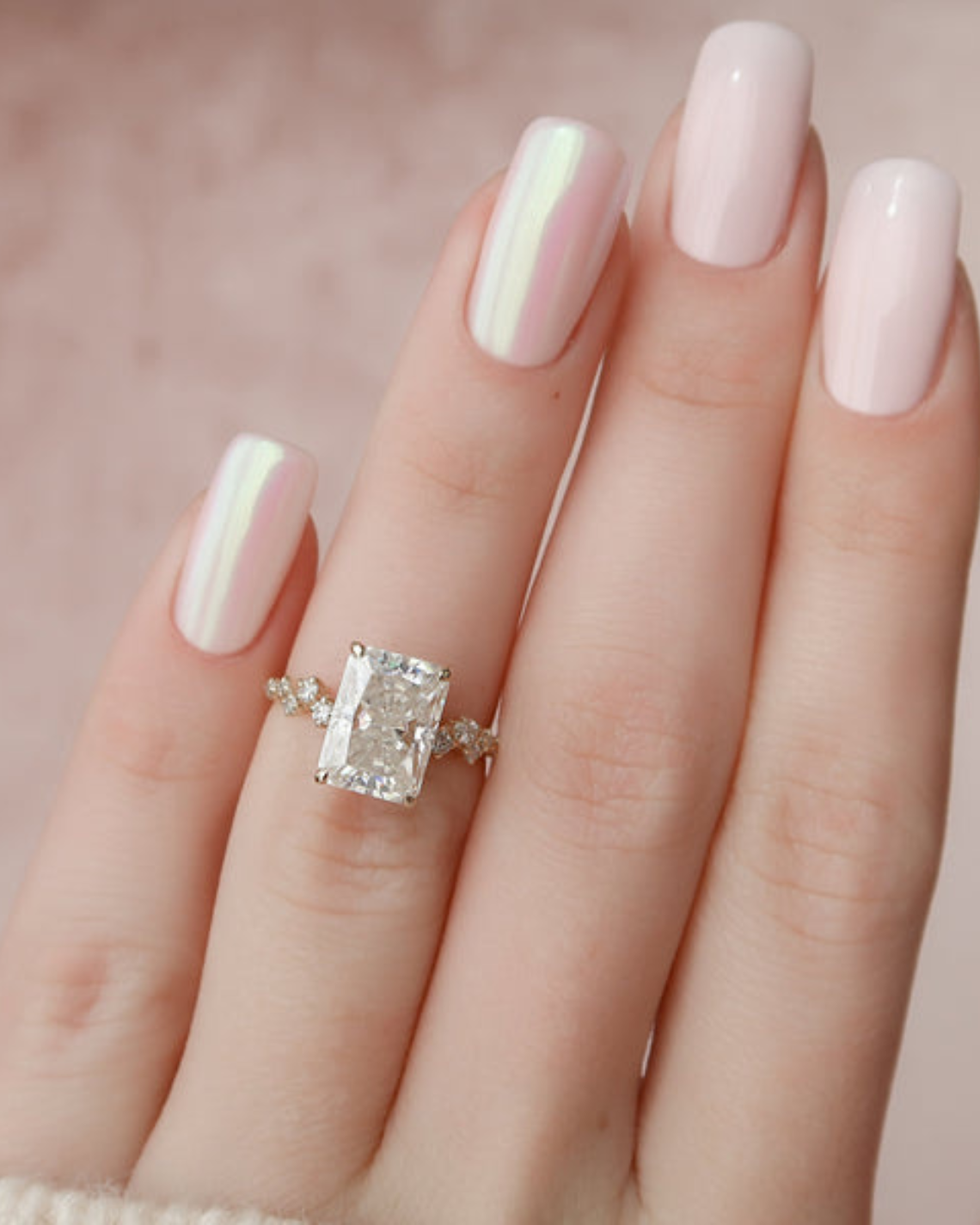 Radiant cut CVD diamond engagement ring with hidden halo and clustered diamond detailing in white gold