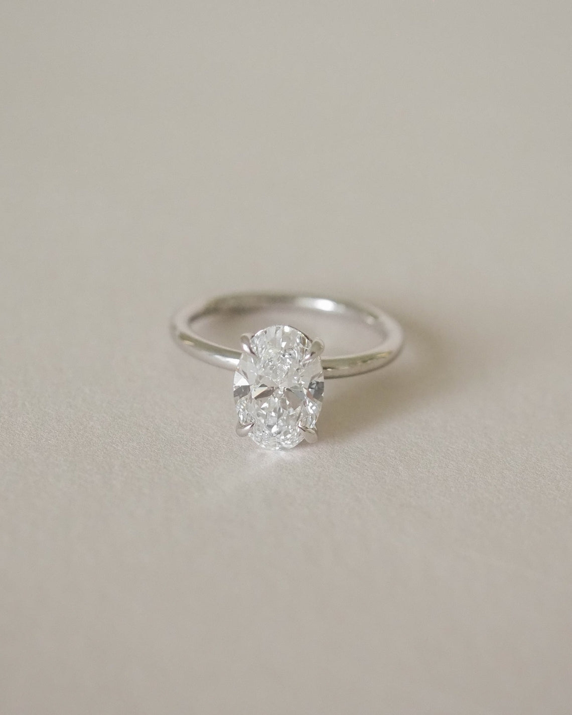 Oval cut moissanite solitaire engagement ring setting in platinum, 1.5-2.5 CT
