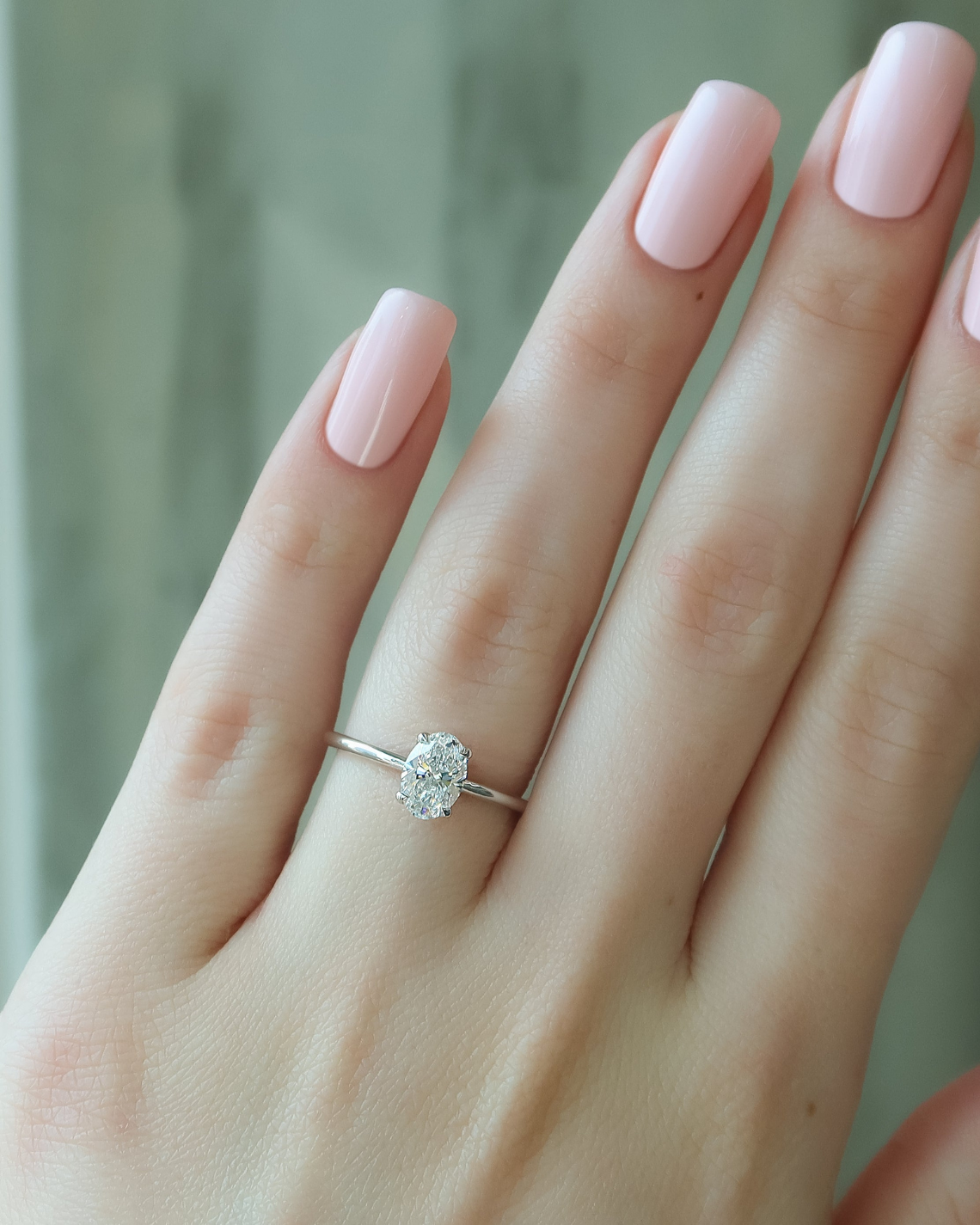 Oval cut CVD diamond solitaire engagement ring in platinum setting