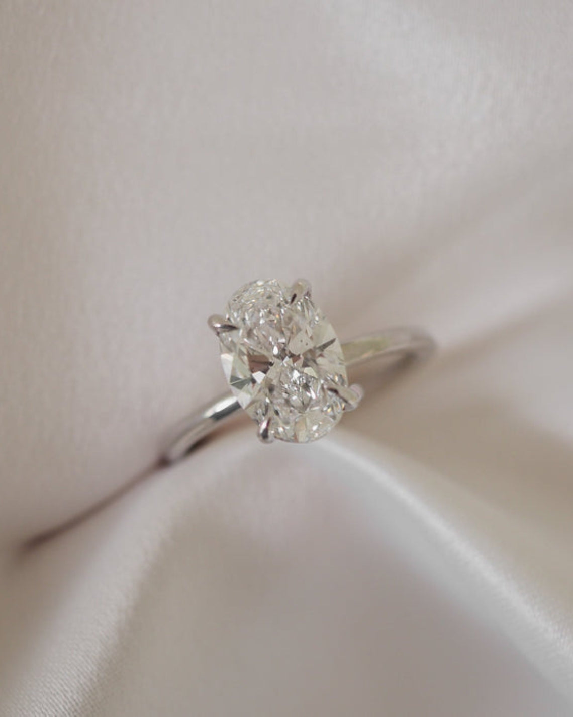 Oval cut moissanite solitaire engagement ring setting in platinum, 1.5-2.5 CT