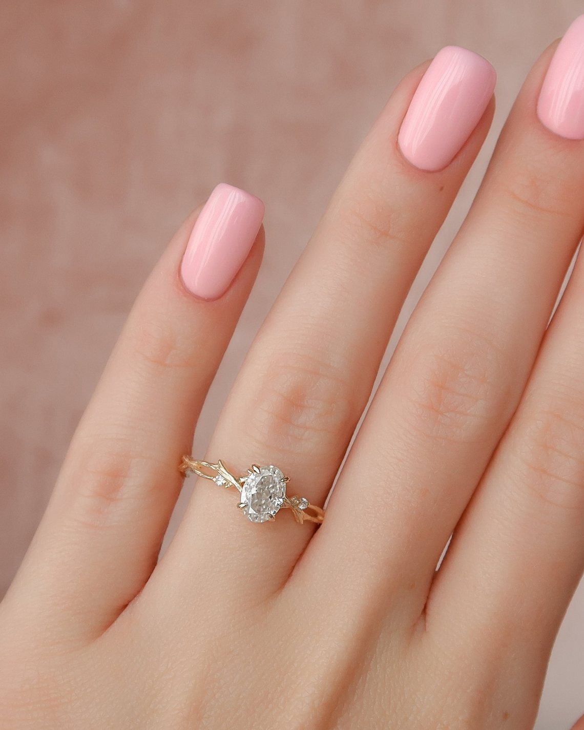 Oval cut CVD diamond engagement ring with twig-style band in white gold