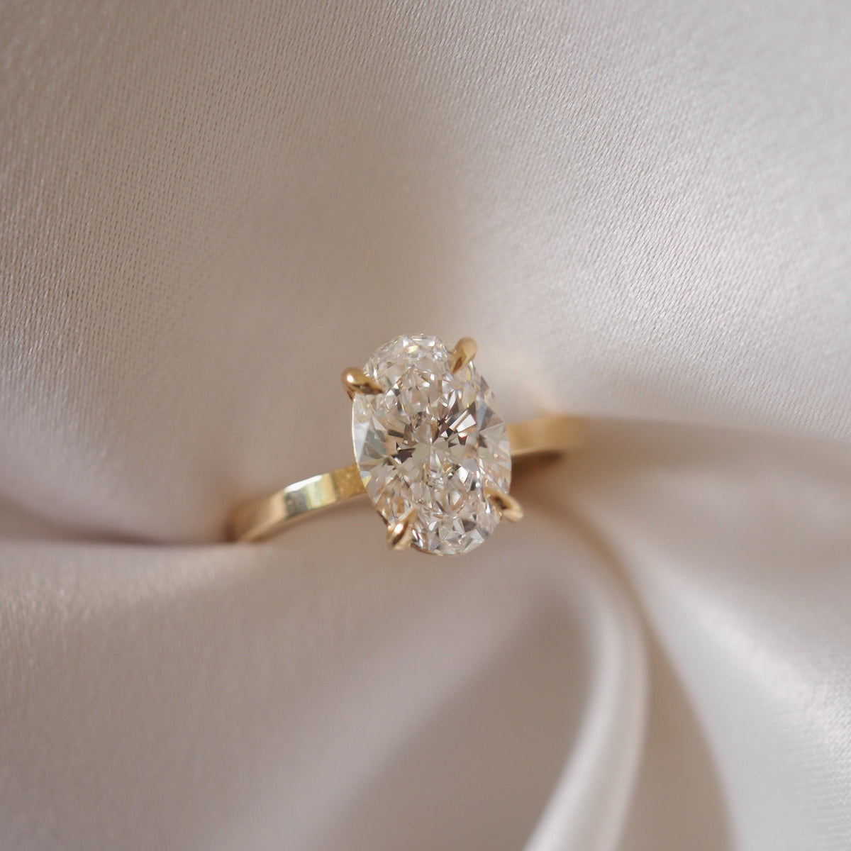 Oval cut moissanite solitaire engagement ring in white gold setting, 1.0-3.0 CT