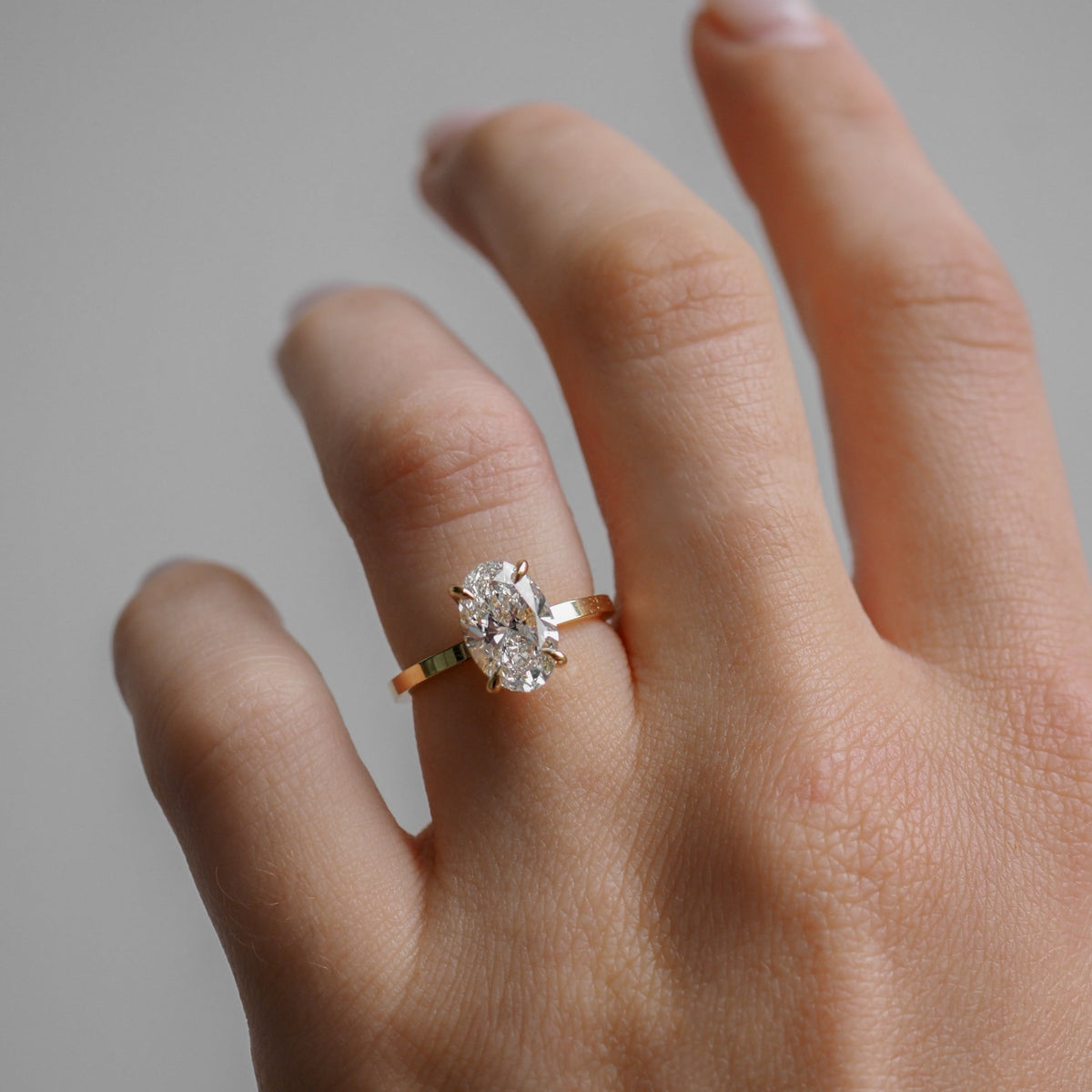 Oval cut moissanite solitaire engagement ring in white gold setting, 1.0-3.0 CT