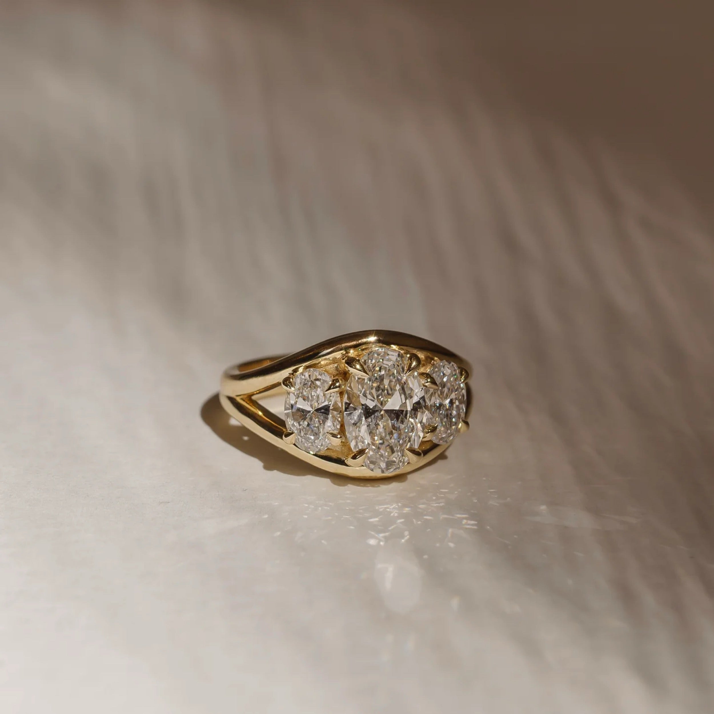 2.5 - 3.5 CT Oval Lab Grown Diamond Split Shank Trilogy Engagement Ring