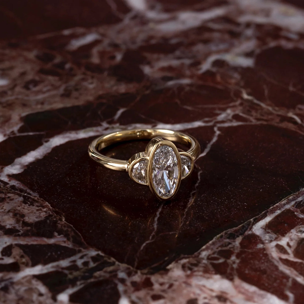 1.0 - 3.5 CT Oval Lab Grown Diamond Bezel Trilogy Engagement Ring