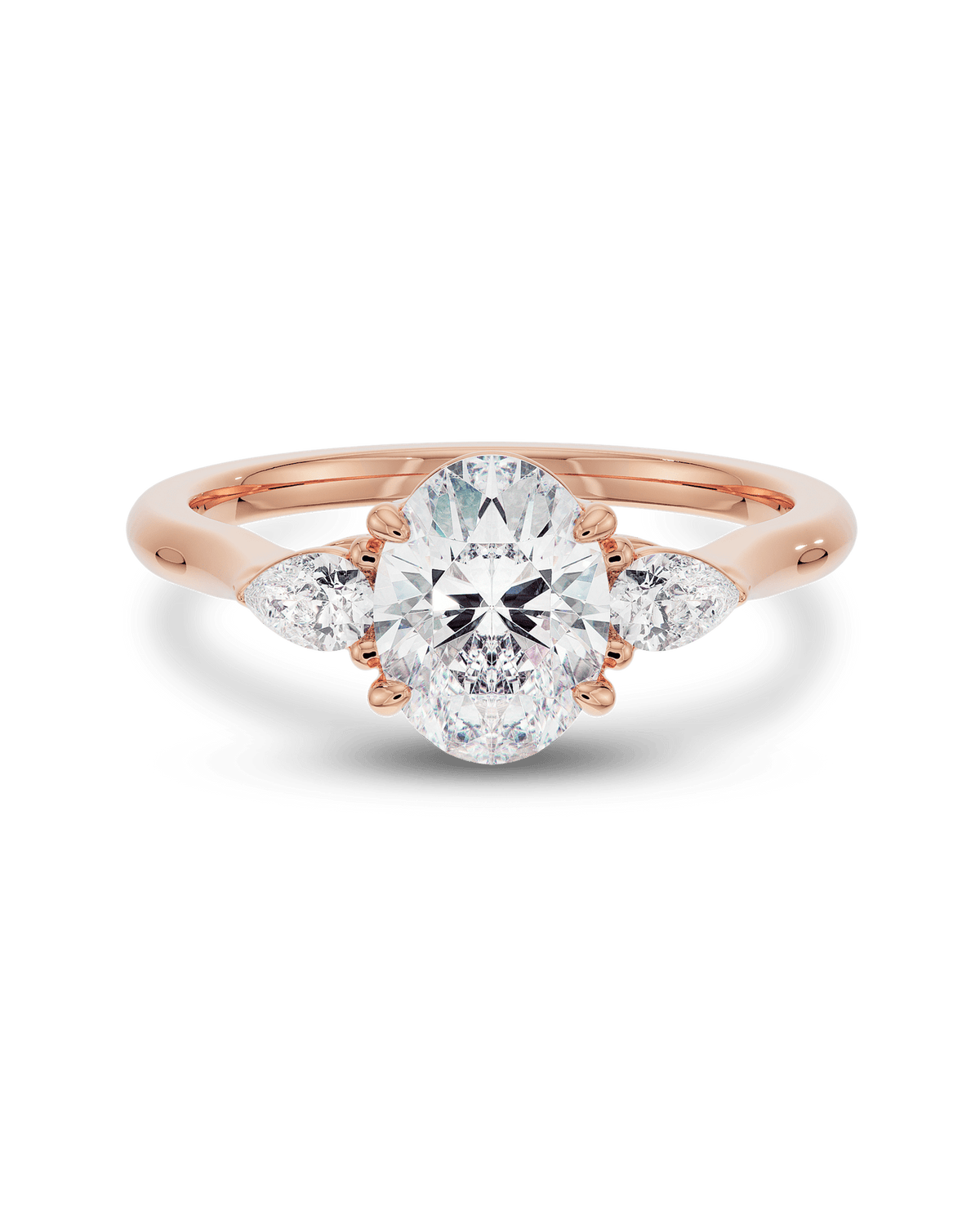 Oval lab grown diamond three stone style engagement ring in gold, 1.5–3.5 CT center with matching side stones for a balanced, romantic look

