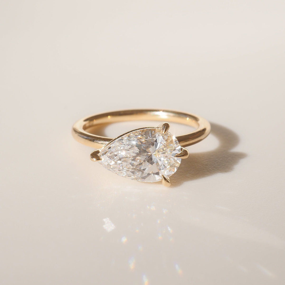 East-west pear shaped moissanite solitaire engagement ring in platinum setting, 2.0-4.0 carats