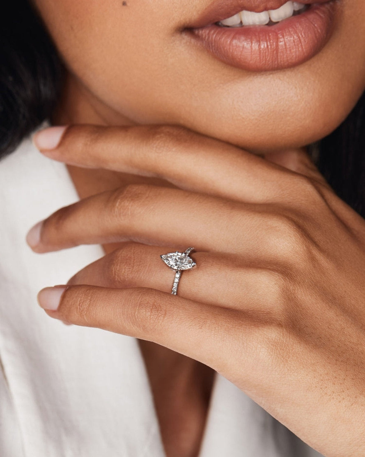 1.0–3.0 CT marquise cut lab grown diamond engagement ring in gold, featuring a slim pave band and a sharp, elongated center stone

