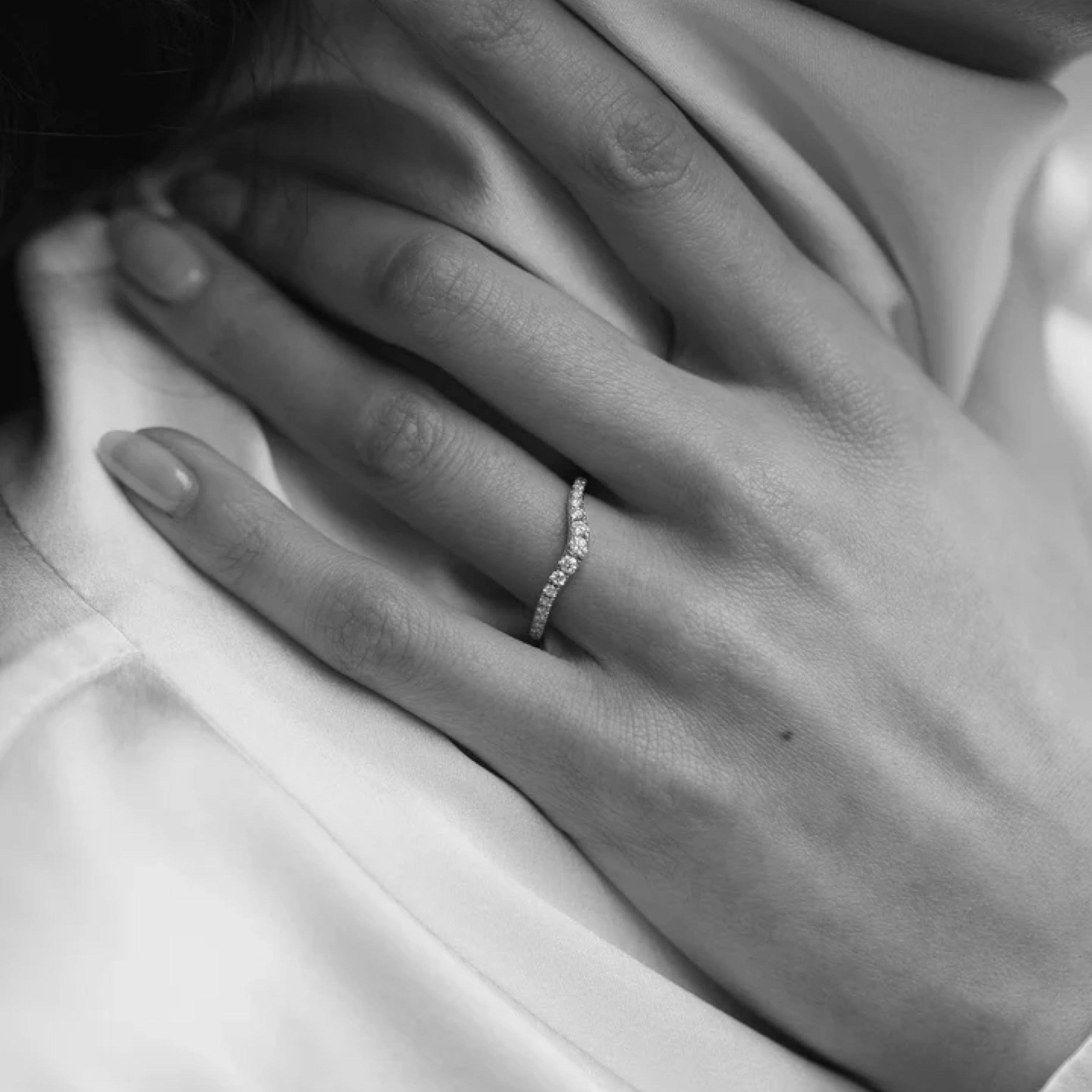 0.50 TCW Round Cut Diamond Curved Wedding Band