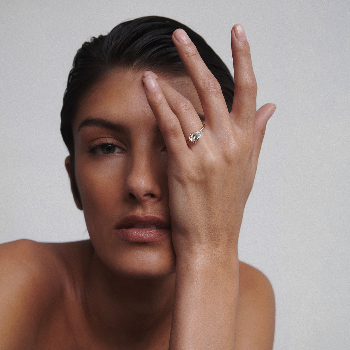 East-west pear shaped moissanite solitaire engagement ring in platinum setting, 2.0-4.0 carats