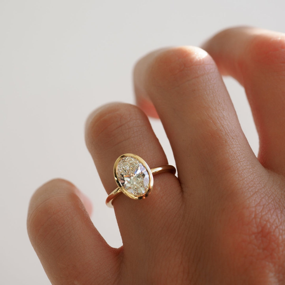 1.5 CT Oval F/VS1 CVD Diamond Bezel Engagement Ring - Camila Brown