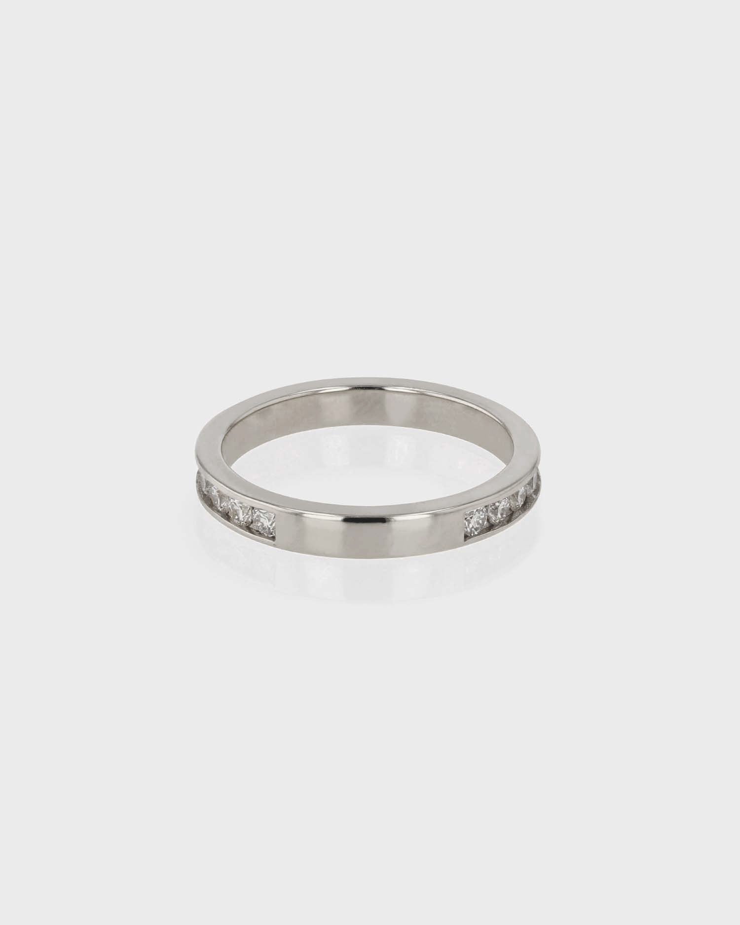 0.70 TCW Round Diamond Channel Wedding Band