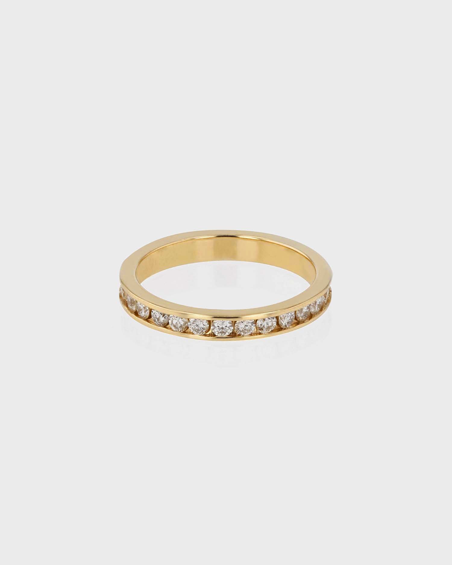 0.70 TCW Round Diamond Channel Wedding Band